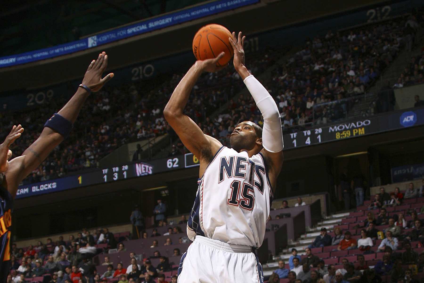 EAST RUTHERFORD, NJ - DECEMBER 18:  Vince Carter #15 of the New Jersey Nets shoots against the Golden State Warriors on December 18, 2006 at the Continental Airlines Arena in East Rutherford, New Jersey. NOTE TO USER: User expressly acknowledges and agrees that, by downloading and or using this Photograph, user is consenting to the terms and conditions of the Getty Images License Agreement. Mandatory Copyright Notice: Copyright 2006 NBAE (Photo by Jesse D. Garrabrant/NBAE via Getty Images) 