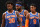 CHARLOTTE, NC - JANUARY 11: Julius Randle #30 , Mitchell Robinson #23, RJ Barrett #9, and Austin Rivers #8 of the New York Knicks looks on, on January 11 2021 at Spectrum Center in Charlotte, North Carolina. NOTE TO USER: User expressly acknowledges and agrees that, by downloading and or using this photograph, User is consenting to the terms and conditions of the Getty Images License Agreement. Mandatory Copyright Notice: Copyright 2021 NBAE (Photo by Kent Smith/NBAE via Getty Images)