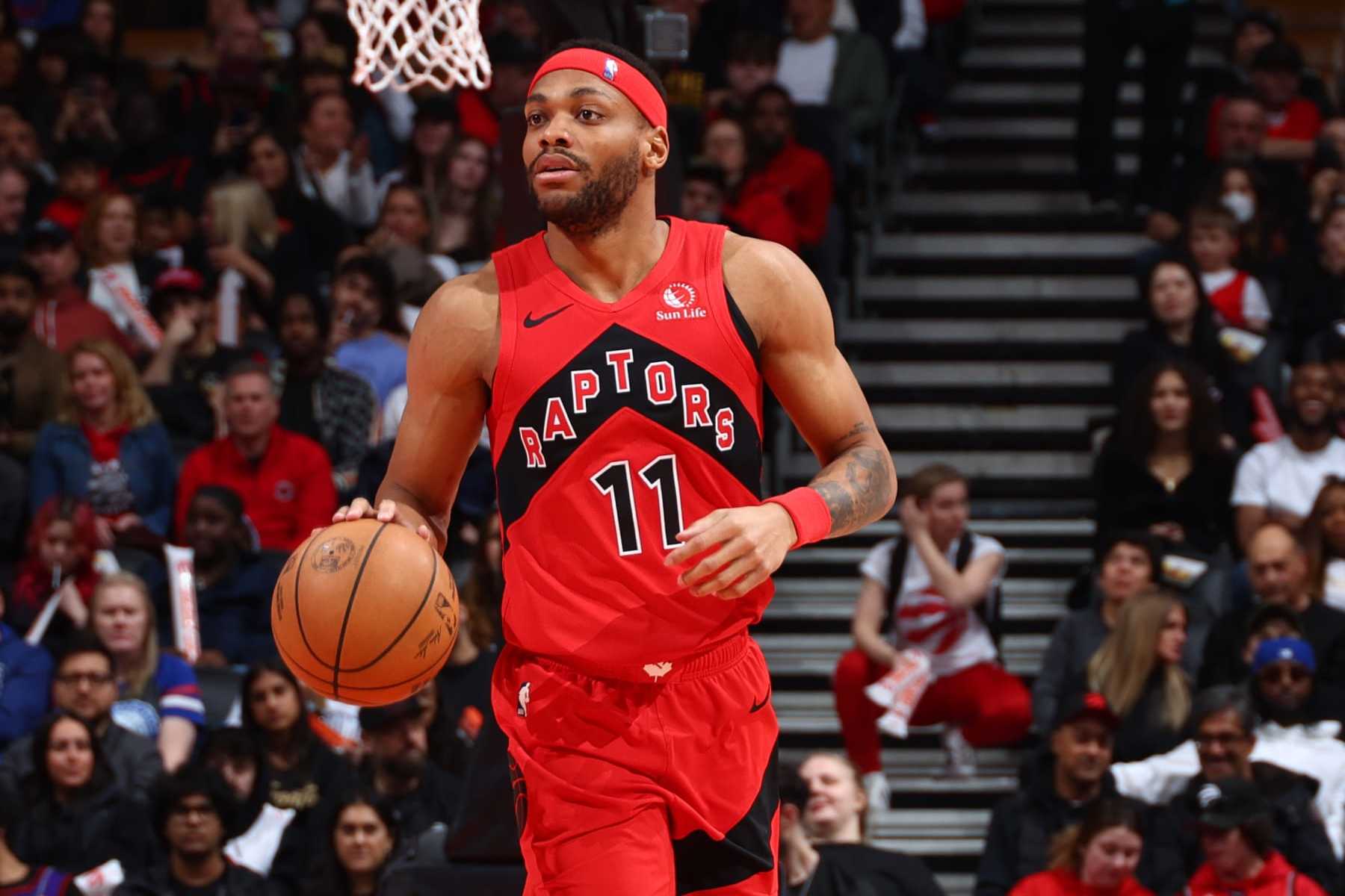 TORONTO, CANADA - MARCH 31: Bruce Brown #11 of the Toronto Raptors dribbles the ball during the game against the Philadelphia 76ers on March 31, 2024 at the Scotiabank Arena in Toronto, Ontario, Canada.  NOTE TO USER: User expressly acknowledges and agrees that, by downloading and or using this Photograph, user is consenting to the terms and conditions of the Getty Images License Agreement.  Mandatory Copyright Notice: Copyright 2024 NBAE (Photo by Vaughn Ridley/NBAE via Getty Images)