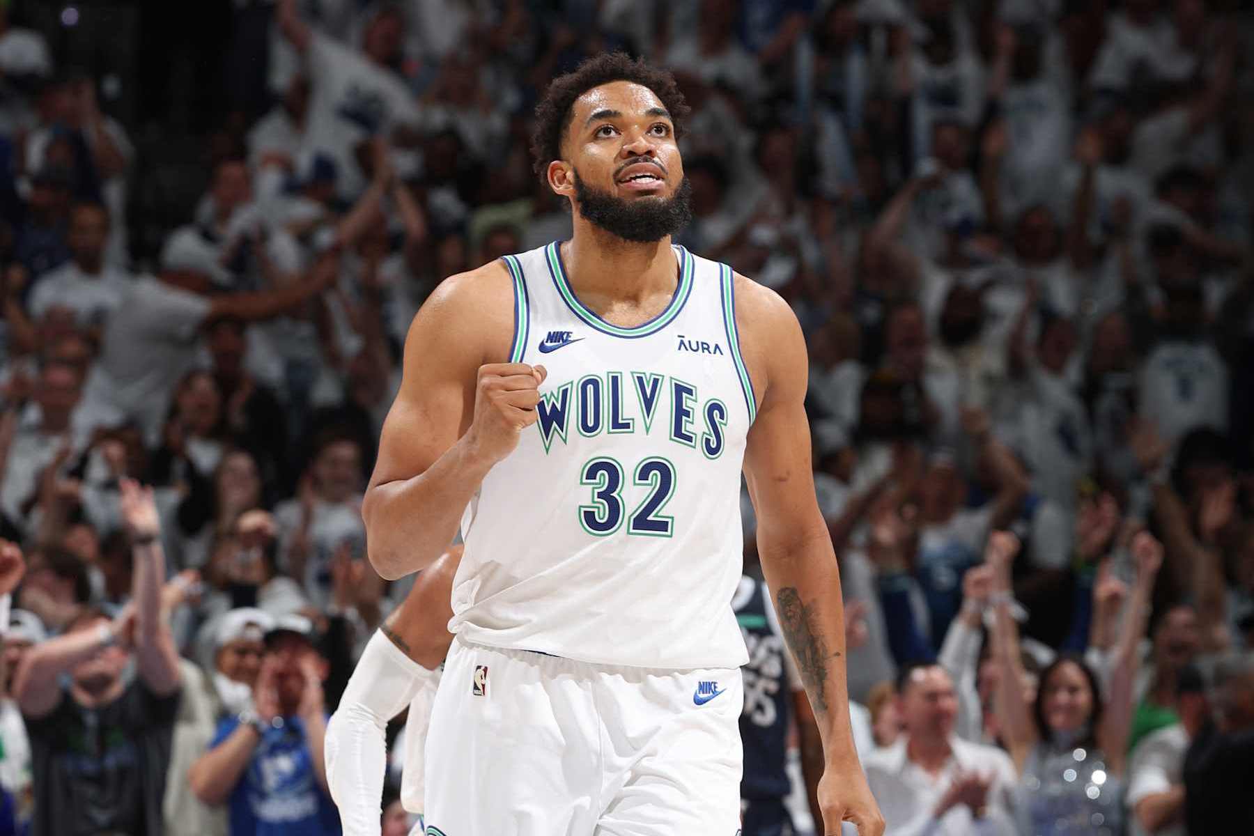 MINNEAPOLIS, MN -  MAY 22:  Karl-Anthony Towns #32 of the Minnesota Timberwolves looks on during the game against the Dallas Mavericks during Game 1 of the Western Conference Finals of the 2024 NBA Playoffs on May 22, 2024 at Target Center in Minneapolis, Minnesota. NOTE TO USER: User expressly acknowledges and agrees that, by downloading and or using this Photograph, user is consenting to the terms and conditions of the Getty Images License Agreement. Mandatory Copyright Notice: Copyright 2024 NBAE (Photo by David Sherman/NBAE via Getty Images)