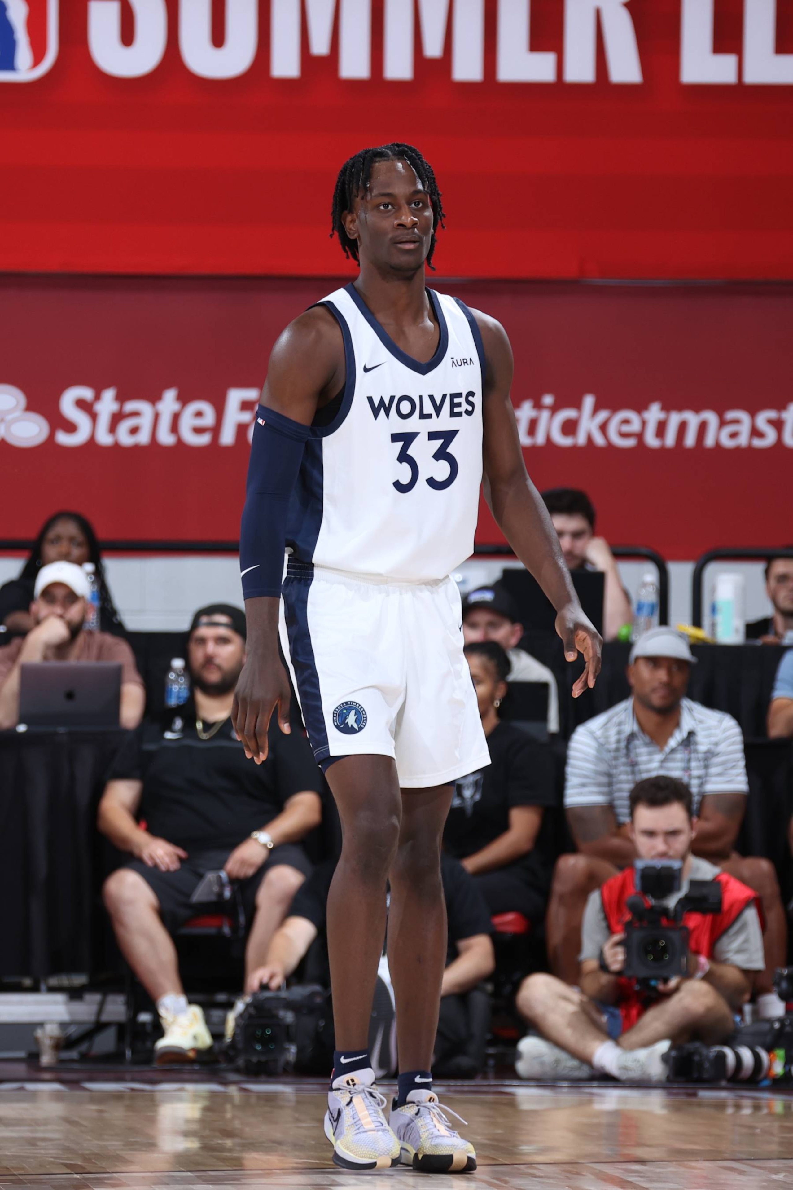 LAS VEGAS, NV - JULY 16: Leonard Miller #33 of the Minnesota Timberwolves looks on during the game against the Philadelphia 76ers on July 16, 2024 at the Cox Pavilion in Las Vegas, Nevada. NOTE TO USER: User expressly acknowledges and agrees that, by downloading and or using this photograph, User is consenting to the terms and conditions of the Getty Images License Agreement. Mandatory Copyright Notice: Copyright 2024 NBAE (Photo by Stephen Gosling/NBAE via Getty Images)