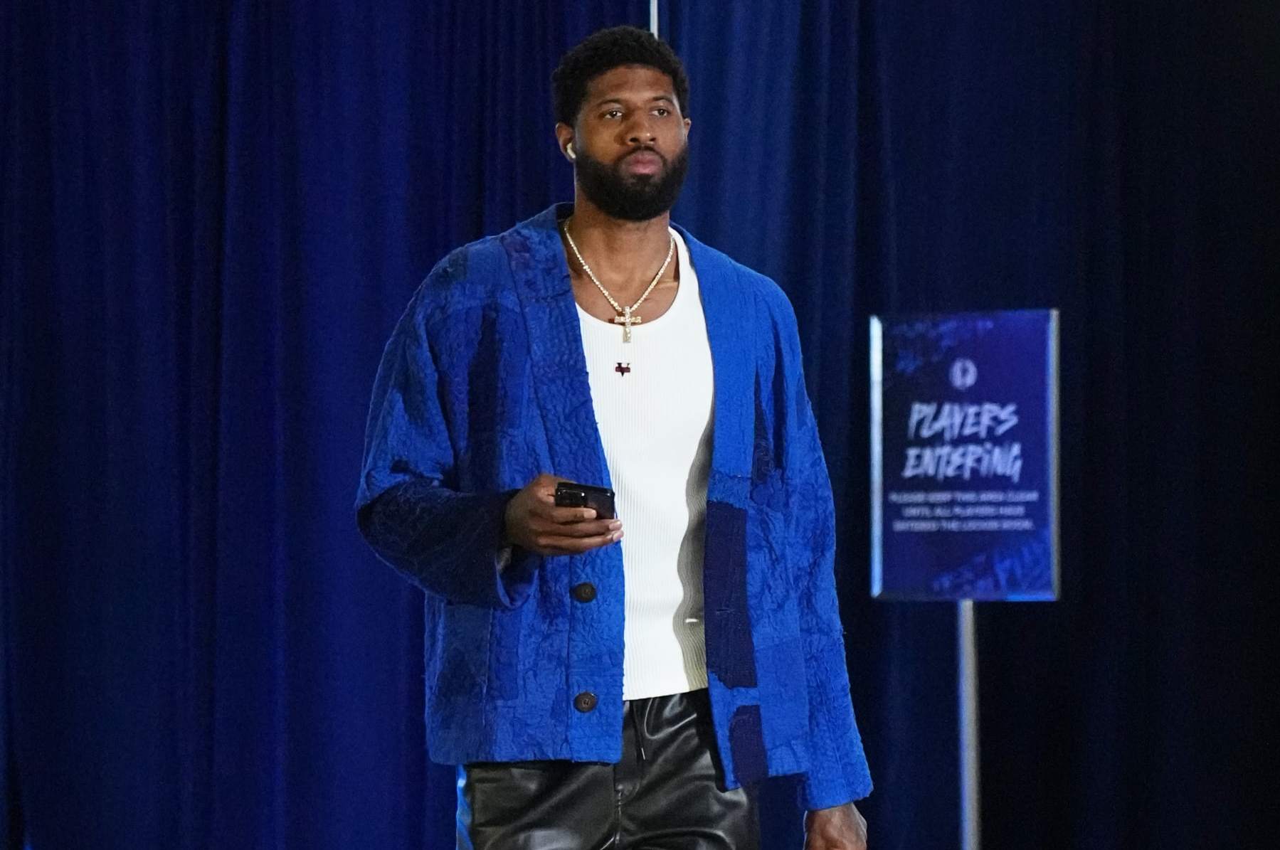 DALLAS, TX - MAY 3: Paul George #13 of the LA Clippers arrives to the arena before the game during Round 1 Game 6 of the 2024 NBA Playoffs  on May 3, 2024  at the American Airlines Center in Dallas, Texas. NOTE TO USER: User expressly acknowledges and agrees that, by downloading and or using this photograph, User is consenting to the terms and conditions of the Getty Images License Agreement. Mandatory Copyright Notice: Copyright 2024 NBAE (Photo by Glenn James/NBAE via Getty Images)