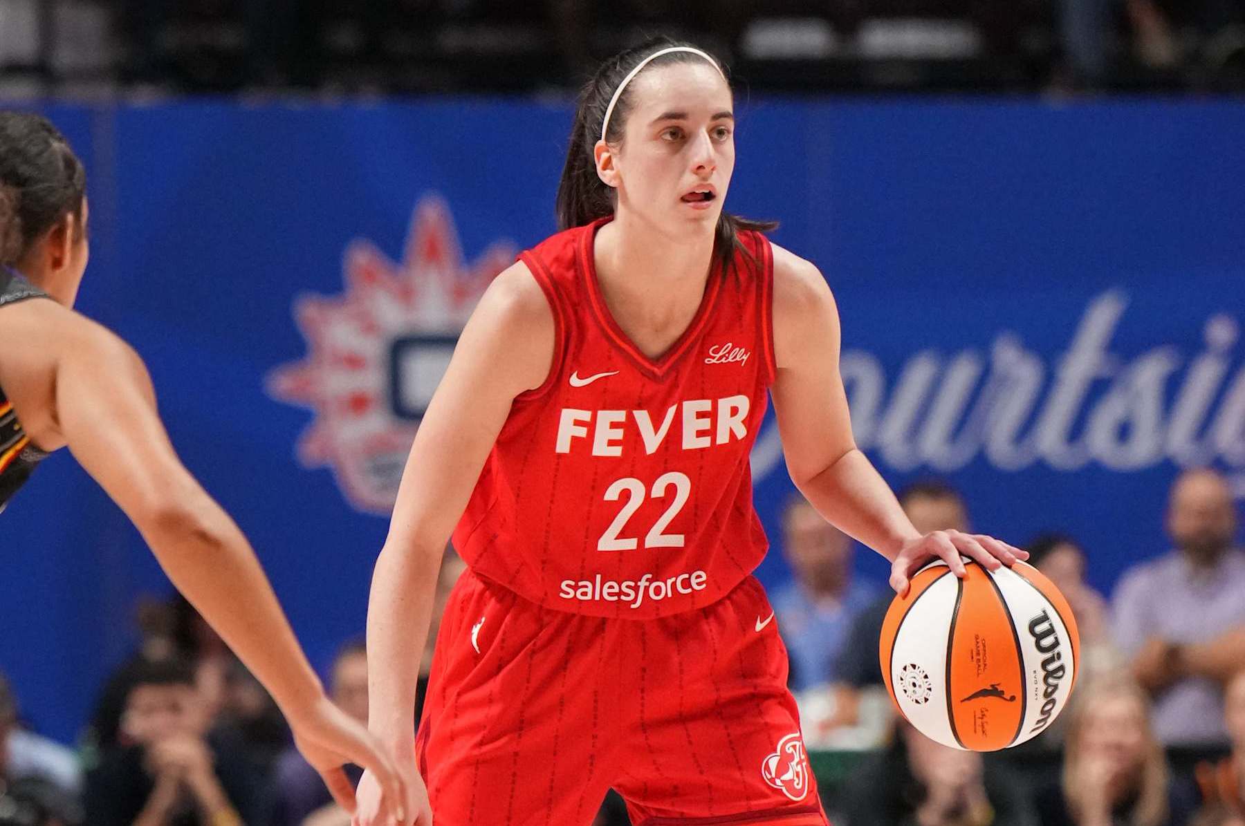 UNCASVILLE, CT - SEPTEMBER 25: Caitlin Clark #22 of the Indiana Fever dribbles the ball during the game against the Connecticut Sun during Round one Game two of the 2024 WNBA Playoffs on September 25, 2024 at the Mohegan Sun Arena in Uncasville, Connecticut. NOTE TO USER: User expressly acknowledges and agrees that, by downloading and or using this photograph, User is consenting to the terms and conditions of the Getty Images License Agreement. Mandatory Copyright Notice: Copyright 2024 NBAE (Photo by Jesse D. Garrabrant/NBAE via Getty Images)