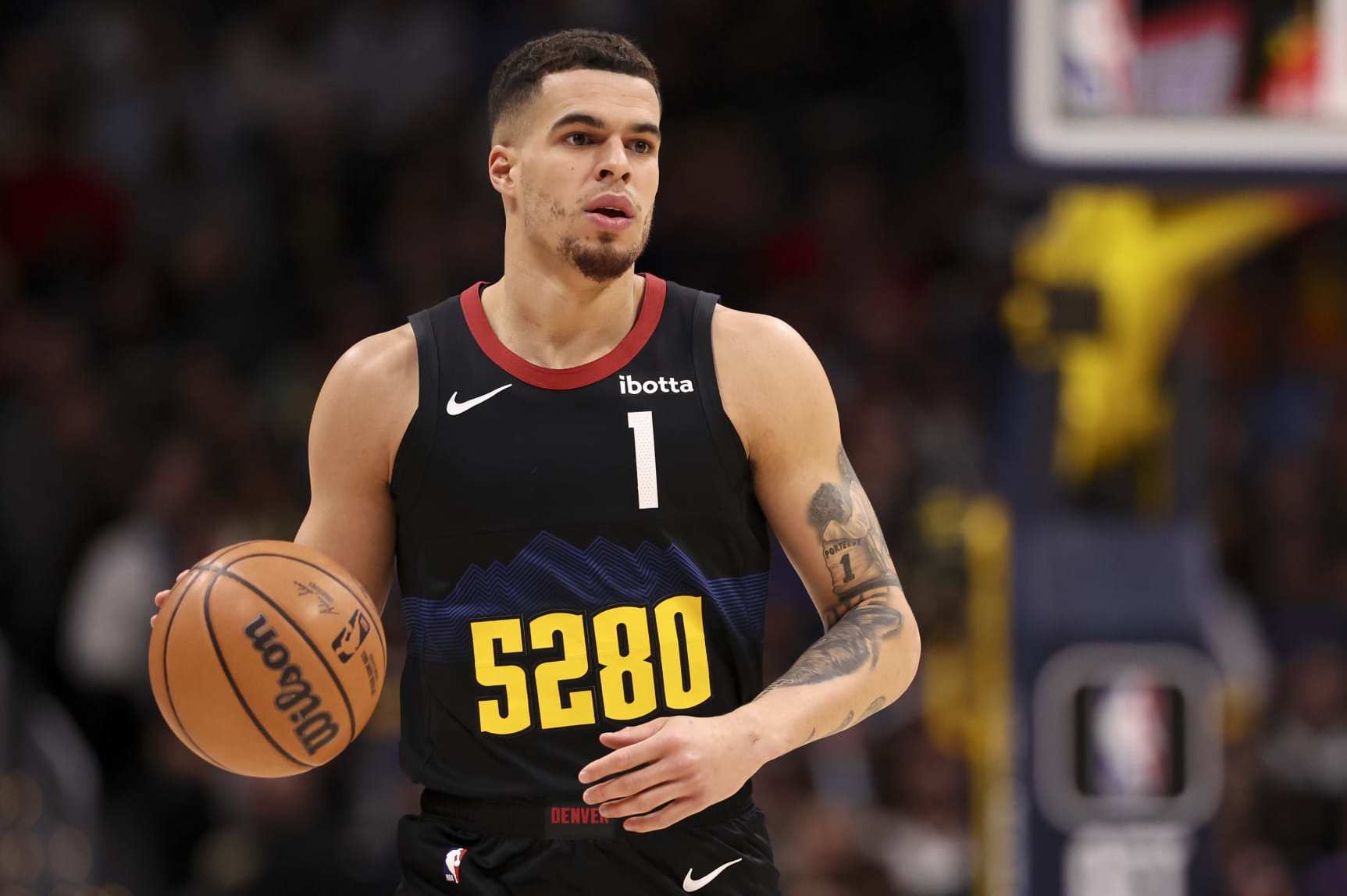 DENVER, COLORADO - JANUARY 27: Michael Porter Jr. #1 of the Denver Nuggets dribbles the ball during the second half of the game against the Philadelphia 76ers at Ball Arena on January 27, 2024 in Denver, Colorado. NOTE TO USER: User expressly acknowledges and agrees that, by downloading and or using this photograph, User is consenting to the terms and conditions of the Getty Images License Agreement. (Photo by Brendall O'Banon/Clarkson Creative/Getty Images)