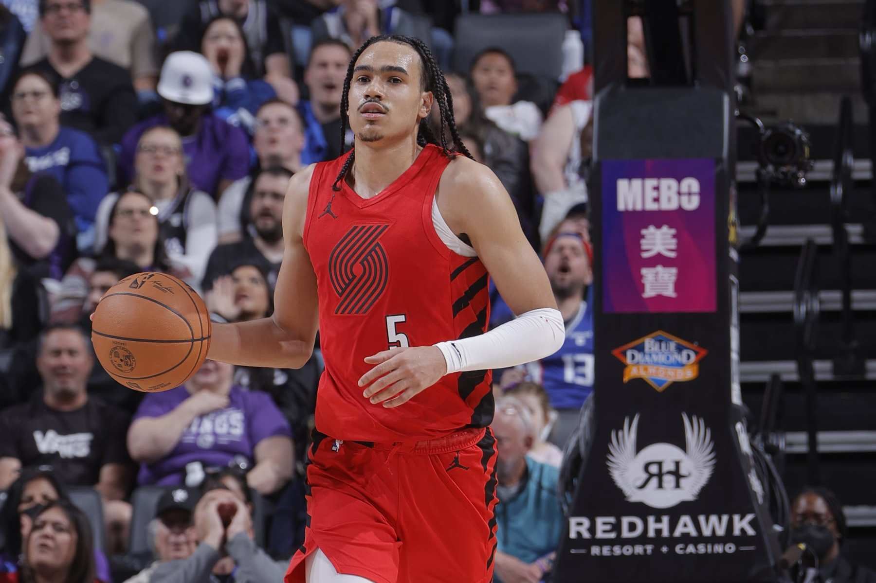 SACRAMENTO, CA - APRIL 14: Dalano Banton #5 of the Portland Trail Blazers handles the ball during the game on April 14, 2024 at Golden 1 Center in Sacramento, California. NOTE TO USER: User expressly acknowledges and agrees that, by downloading and or using this Photograph, user is consenting to the terms and conditions of the Getty Images License Agreement. Mandatory Copyright Notice: Copyright 2024 NBAE (Photo by Rocky Widner/NBAE via Getty Images)