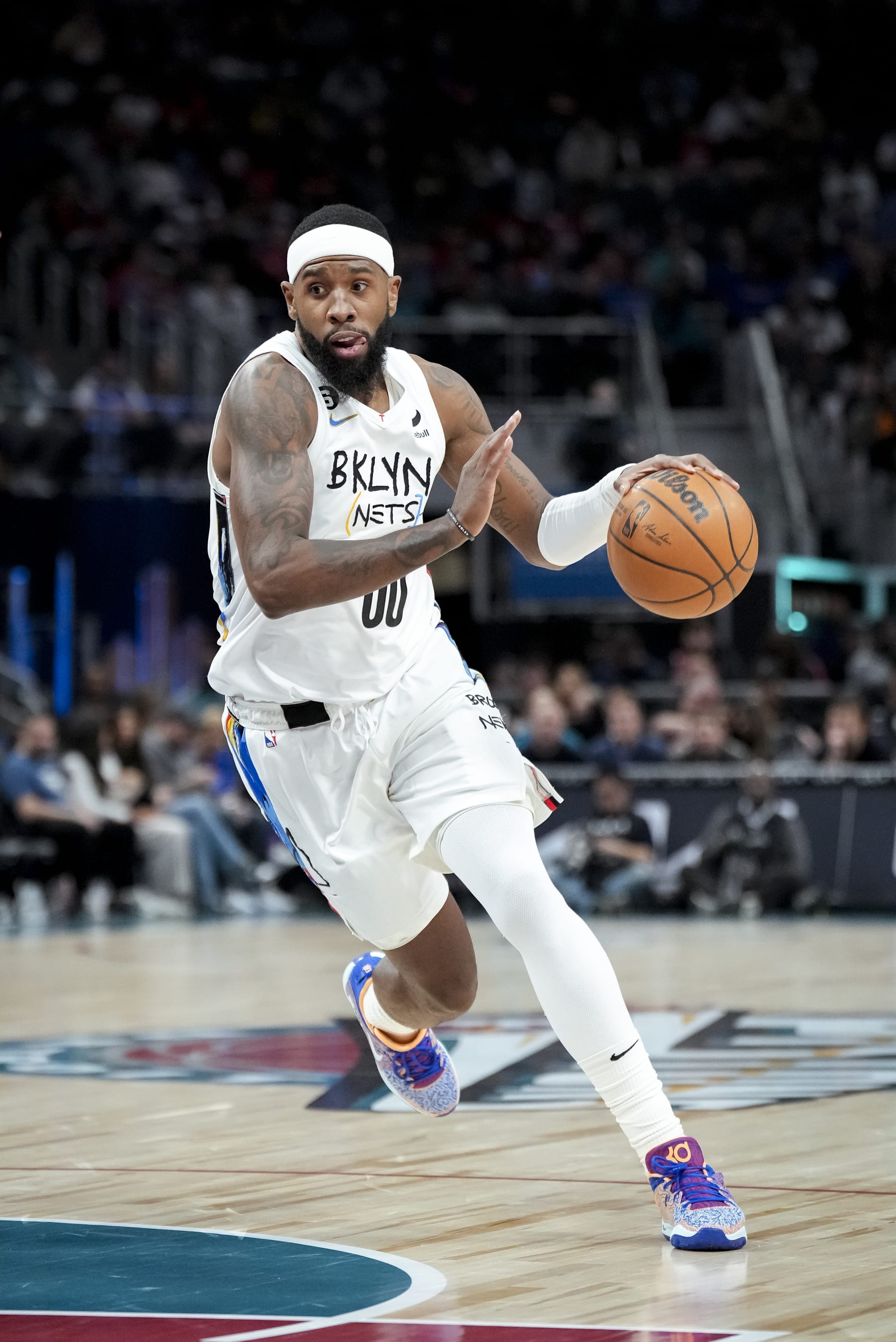 DETROIT, MICHIGAN - APRIL 05: Royce O'Neale #00 of the Brooklyn Nets handles the ball against the Detroit Pistons at Little Caesars Arena on April 05, 2023 in Detroit, Michigan. NOTE TO USER: User expressly acknowledges and agrees that, by downloading and or using this photograph, User is consenting to the terms and conditions of the Getty Images License Agreement. (Photo by Nic Antaya/Getty Images)