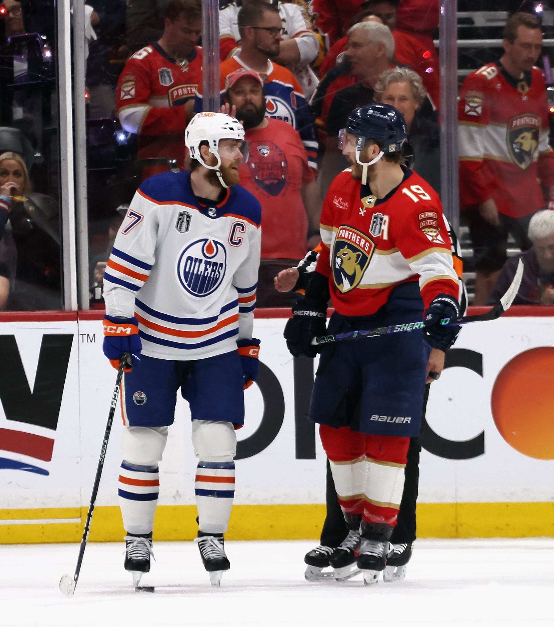 SUNRISE, FLORIDA - JUNE 10: Connor McDavid #97 of the Edmonton Oilers chats with Matthew Tkachuk #19 of the Florida Panthers in Game Two of the 2024 Stanley Cup Final at Amerant Bank Arena on June 10, 2024 in Sunrise, Florida. (Photo by Bruce Bennett/Getty Images)
