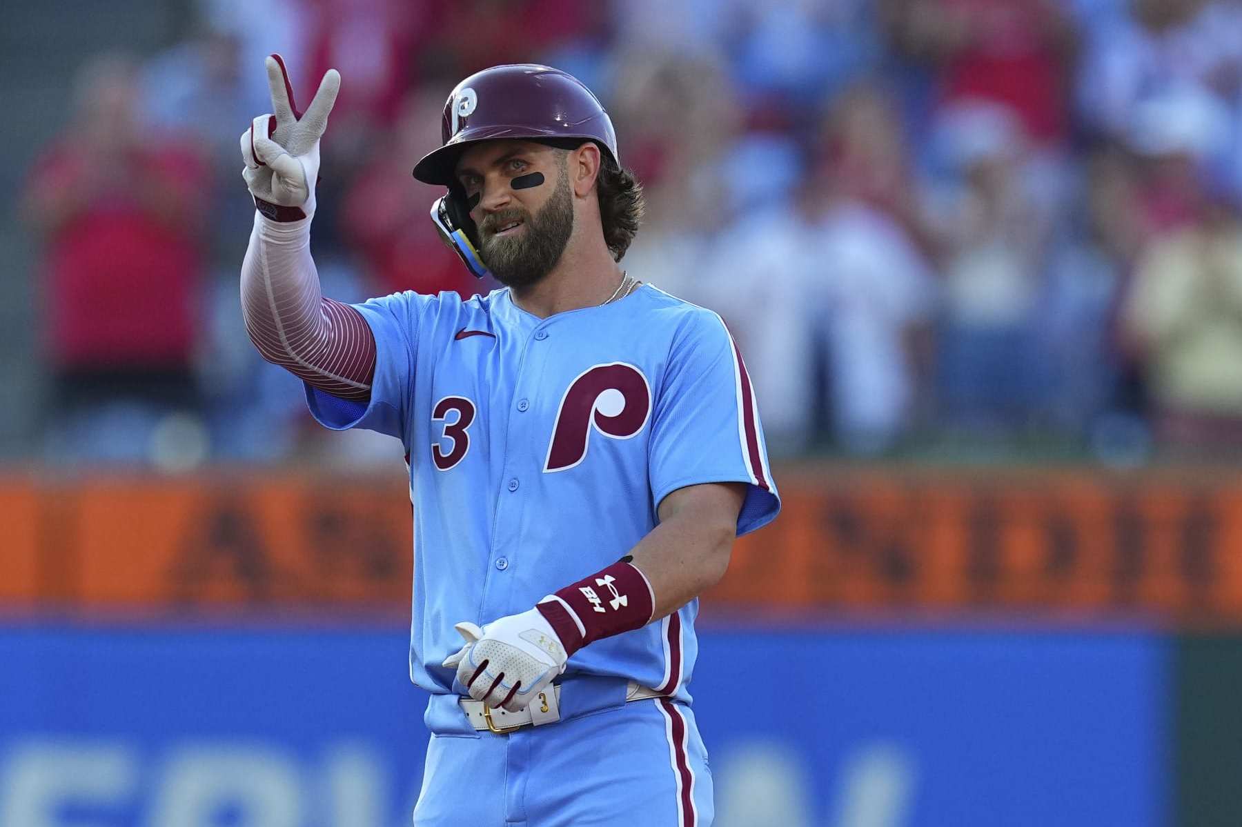 PHILADELPHIA, PENNSYLVANIA - JUNE 27: Bryce Harper #3 of the Philadelphia Phillies gestures after hitting an RBI double in the bottom of the first inning against the Miami Marlins at Citizens Bank Park on June 27, 2024 in Philadelphia, Pennsylvania. (Photo by Mitchell Leff/Getty Images)