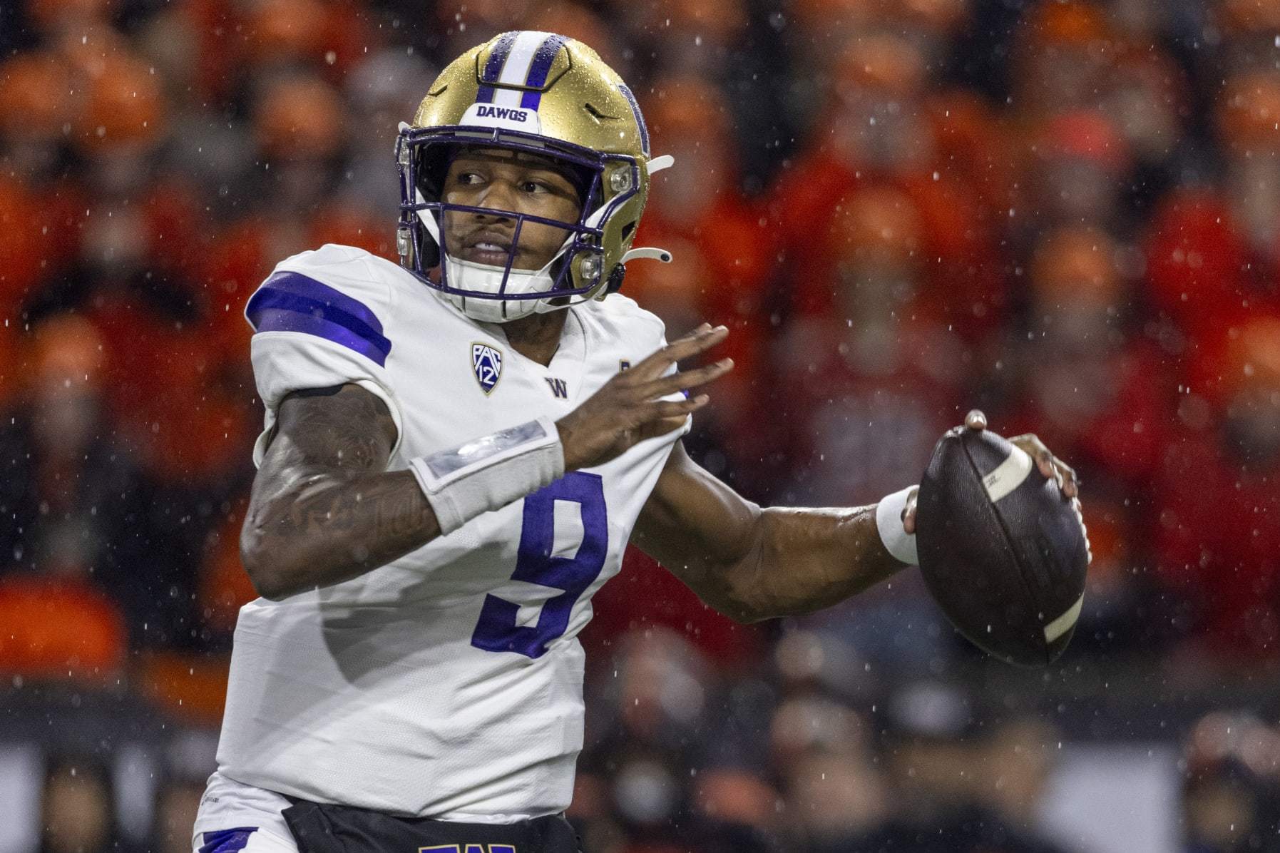 CORVALLIS, OREGON - NOVEMBER 18: Quarterback Michael Penix Jr. #9 of the Washington Huskies passes the ball for a touchdown during the first quarter against the Oregon State Beavers at Reser Stadium on November 18, 2023 in Corvallis, Oregon. (Photo by Tom Hauck/Getty Images)