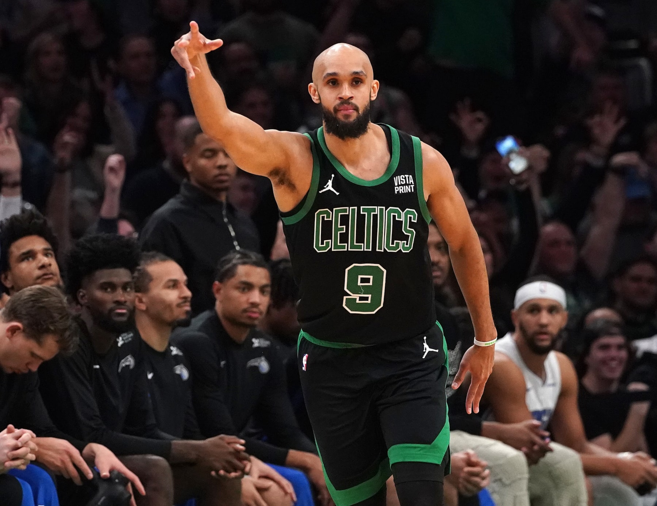 Boston, MA - December 15: Boston Celtics PG Derrick White celebrates a 3-pointer in the third quarter. The Celtics beat the Orlando Magic, 128-111. (Photo by Barry Chin/The Boston Globe via Getty Images)