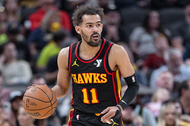 INDIANAPOLIS, INDIANA - APRIL 14: Trae Young #11 of the Atlanta Hawks brings the ball up court during the game against the Indiana Pacers at Gainbridge Fieldhouse on April 14, 2024 in Indianapolis, Indiana. NOTE TO USER: User expressly acknowledges and agrees that, by downloading and or using this photograph, User is consenting to the terms and conditions of the Getty Images License Agreement. (Photo by Michael Hickey/Getty Images)