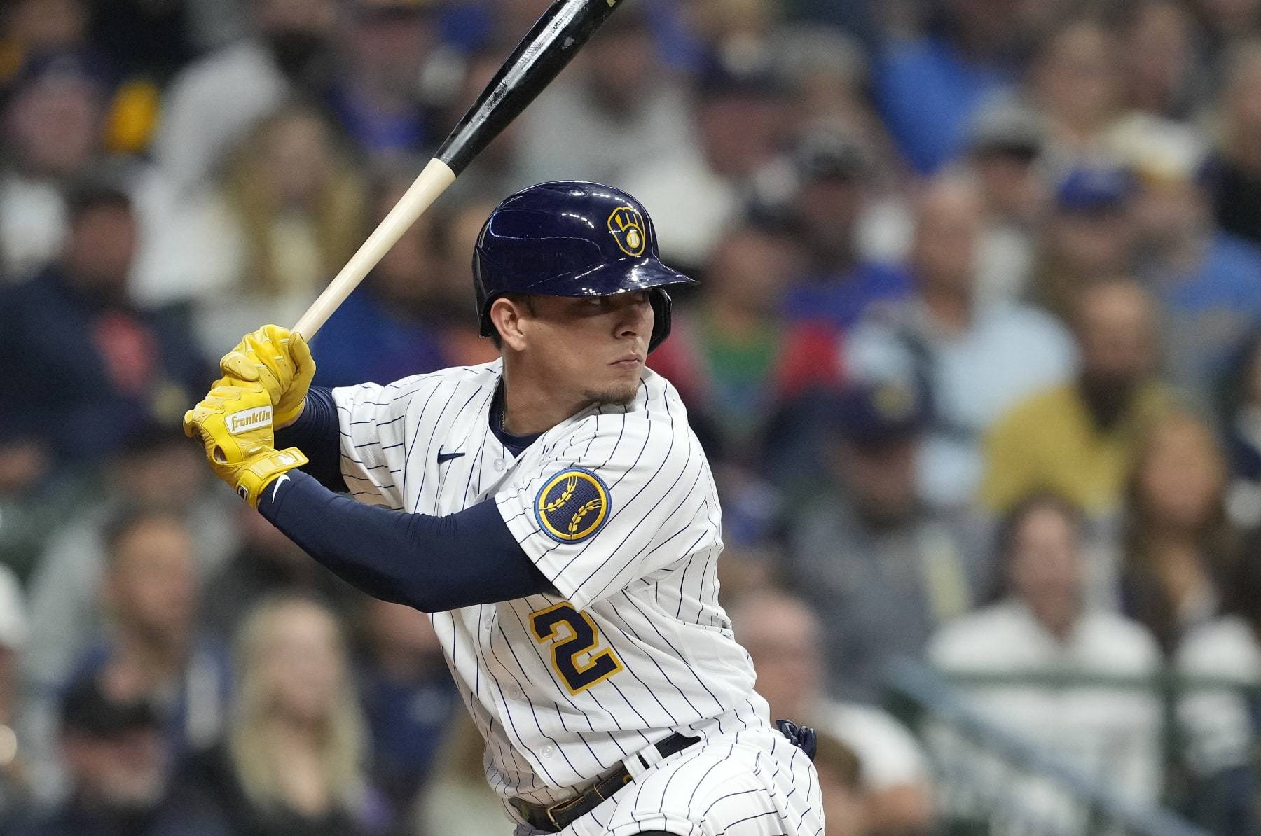 MILWAUKEE, WISCONSIN - OCTOBER 01: Luis Urias #2 of the Milwaukee Brewers bats against the Miami Marlins during the sixth inning at American Family Field on October 01, 2022 in Milwaukee, Wisconsin. (Photo by Patrick McDermott/Getty Images) MILWAUKEE, WISCONSIN - OCTOBER 01: Luis Urias #2 of the Milwaukee Brewers bats against the Miami Marlins during the sixth inning at American Family Field on October 01, 2022 in Milwaukee, Wisconsin. (Photo by Patrick McDermott/Getty Images)