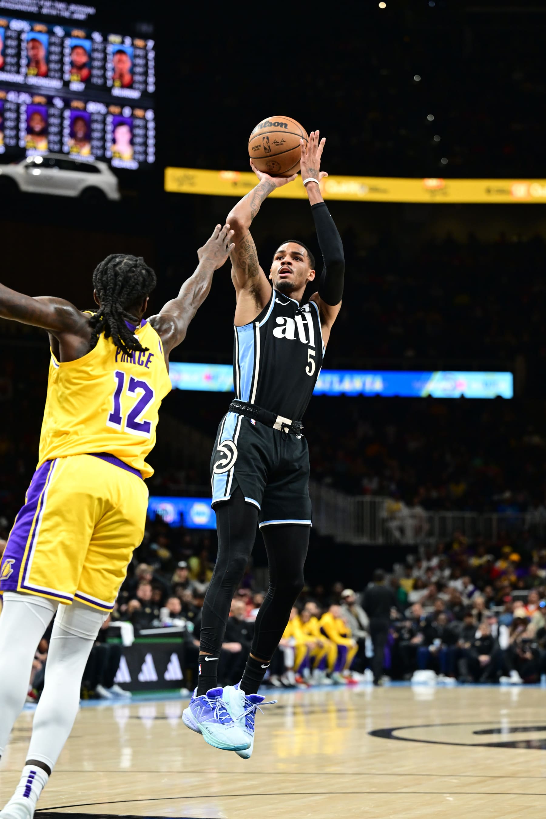 ATLANTA, GA - JANUARY 30: Dejounte Murray #5 of the Atlanta Hawks shoots the ball throughout the game  towards the Los Angeles Lakers on January 30, 2024 at State Farm Arena in Atlanta, Georgia.  NOTE TO USER: User expressly acknowledges and agrees that, by downloading and/or the employ of this Photo, consumer is consenting to the terms and stipulations of the Getty Pictures License Agreement. Mandatory Copyright Behold: Copyright 2024 NBAE (Photo by Adam Hagy/NBAE through Getty Pictures)