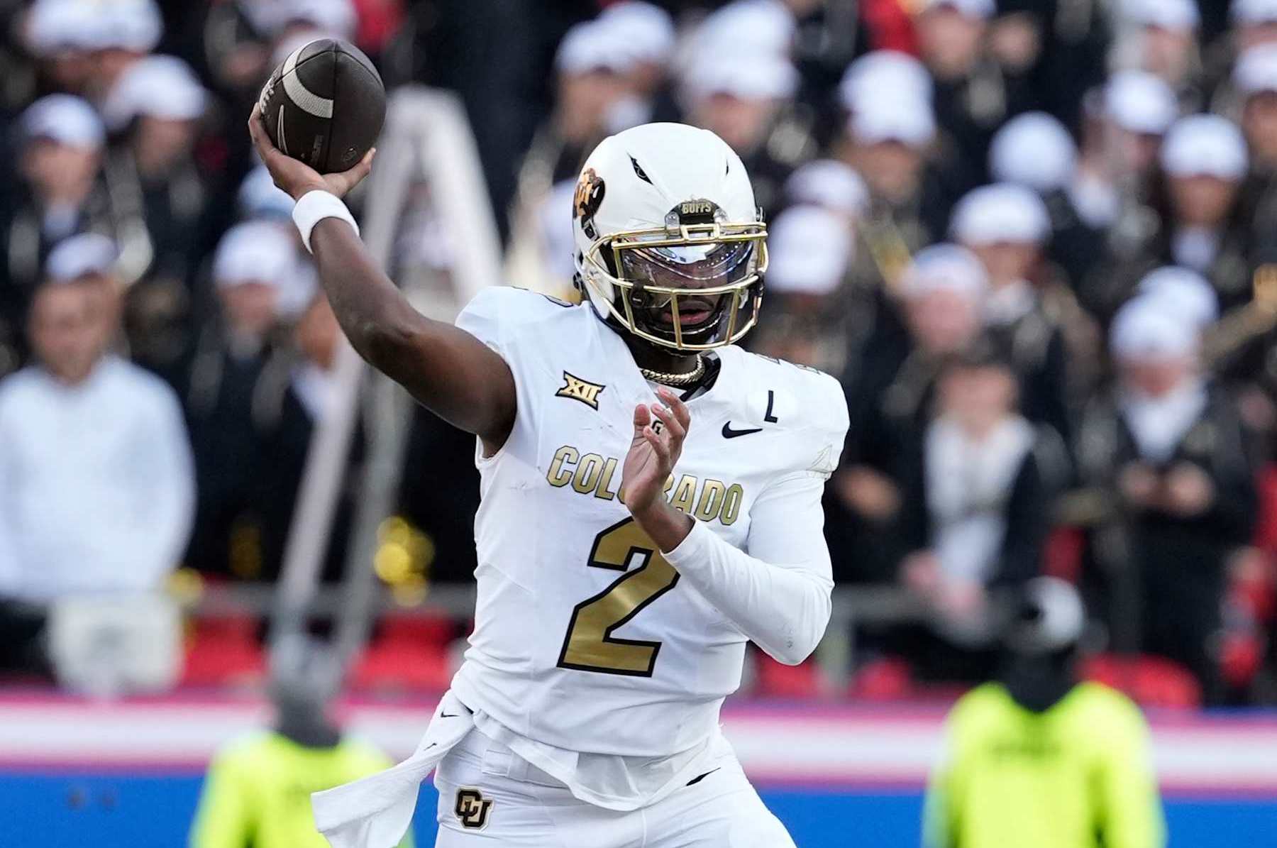 KANSAS CITY, MISSOURI - NOVEMBER 23: Quarterback Shedeur Sanders #2 of the Colorado Buffaloes passes in the first half against the Kansas Jayhawks at Arrowhead Stadium on November 23, 2024 in Kansas City, Missouri.  (Photo by Ed Zurga/Getty Images)