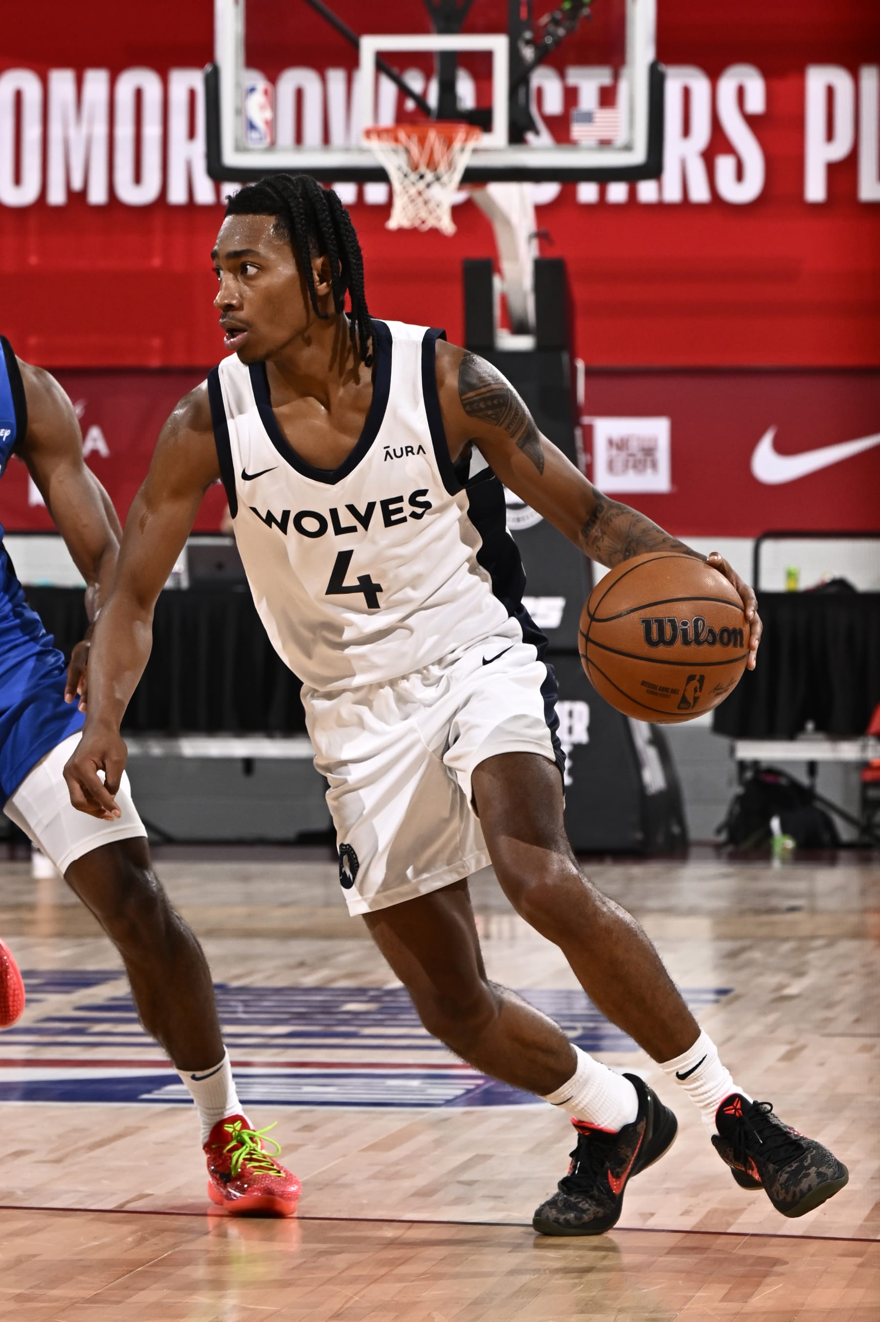 LAS VEGAS, NV - JULY 21: Rob Dillingham #4 of the Minnesota Timberwolves handles the ball during the game against the Orlando Magic on July 21, 2024 at the Cox Pavilion in Las Vegas, Nevada. NOTE TO USER: User expressly acknowledges and agrees that, by downloading and or using this photograph, User is consenting to the terms and conditions of the Getty Images License Agreement. Mandatory Copyright Notice: Copyright 2024 NBAE (Photo by David Dow/NBAE via Getty Images)