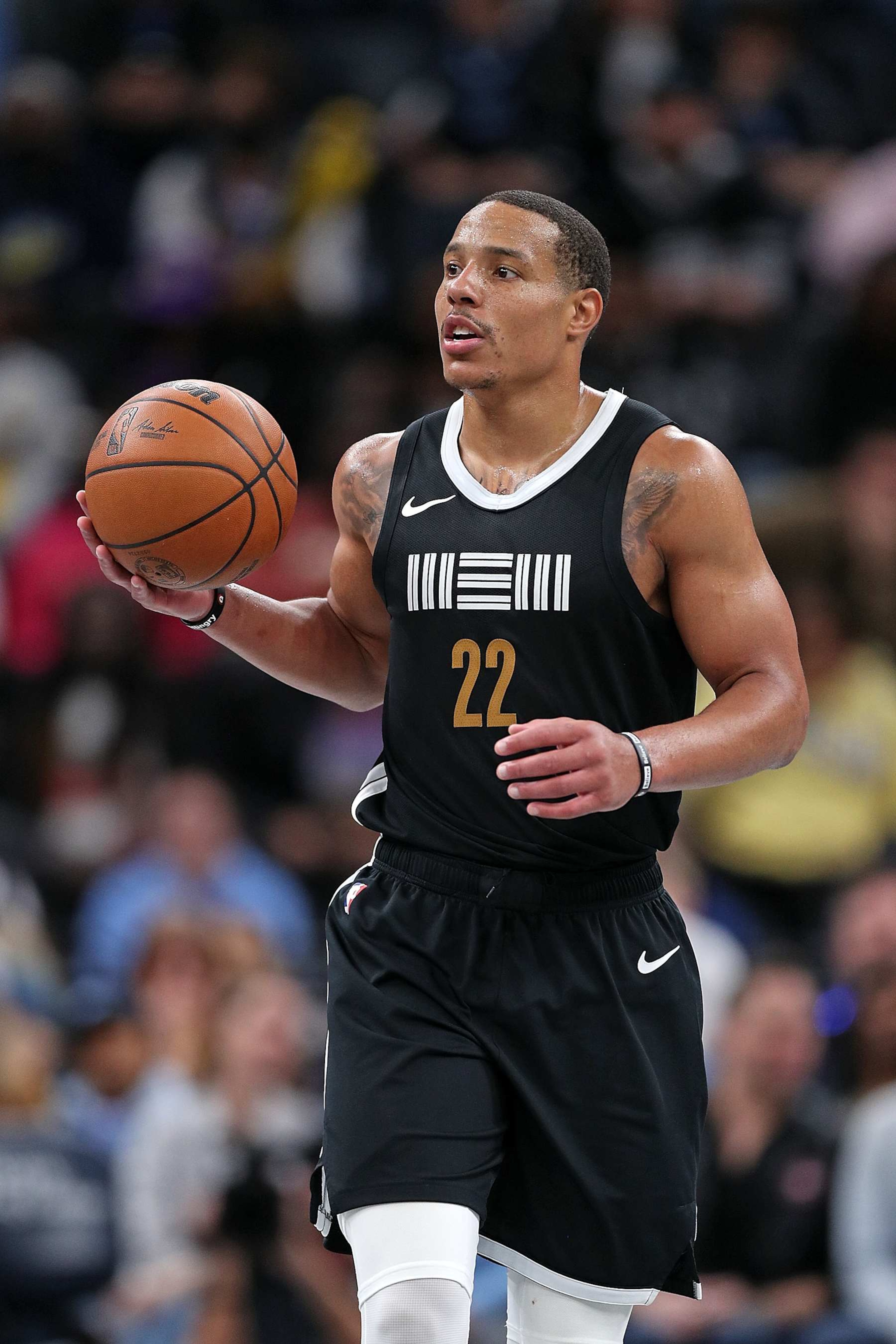 MEMPHIS, TENNESSEE - MARCH 27: Desmond Bane #22 of the Memphis Grizzlies brings the ball up court during the game against the Los Angeles Lakers at FedExForum on March 27, 2024 in Memphis, Tennessee. NOTE TO USER: User expressly acknowledges and agrees that, by downloading and or using this photograph, User is consenting to the terms and conditions of the Getty Images License Agreement. (Photo by Justin Ford/Getty Images)