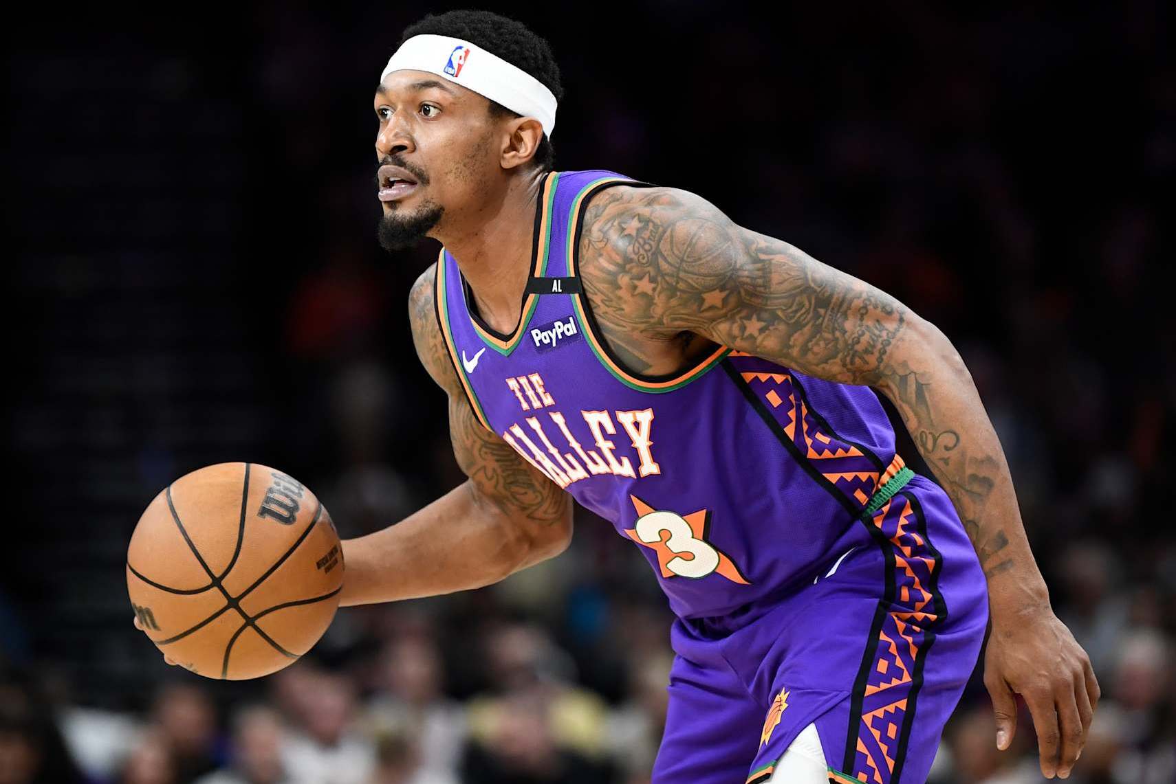 PHOENIX, ARIZONA - JANUARY 11: Bradley Beal #3 of the Phoenix Suns controls the ball during the first half of the NBA game against the Utah Jazz  at Footprint Center on January 11, 2025 in Phoenix, Arizona. NOTE TO USER: User expressly acknowledges and agrees that, by downloading and or using this photograph, User is consenting to the terms and conditions of the Getty Images License Agreement. (Photo by Kelsey Grant/Getty Images)