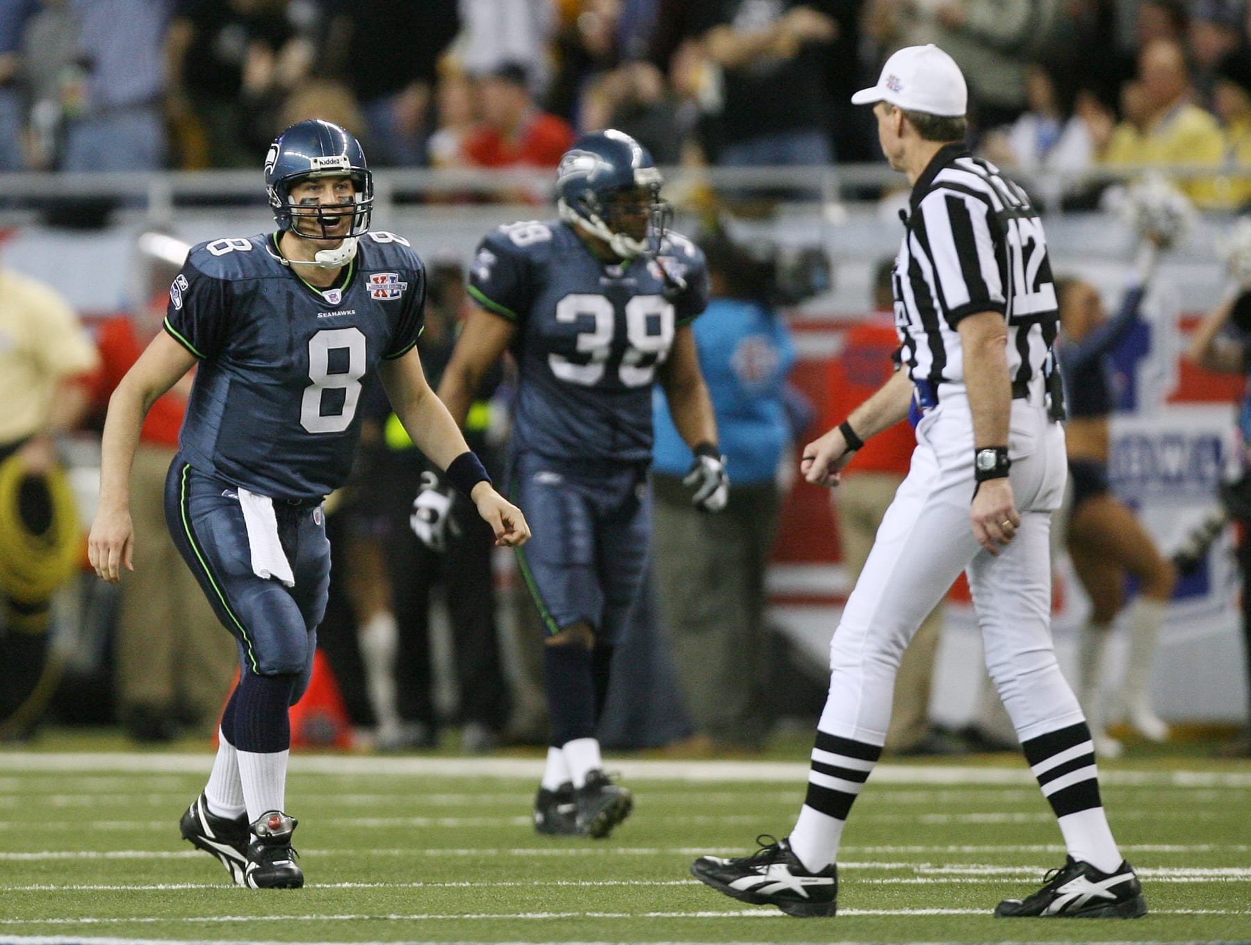 DETROIT - FEBRUARY 05: Quarterback Matt Hasselbeck #8 of the Seattle Seahawks argues a call with referee Bill Leavy after throwing a pass out of bounds to receiver Darrell Jackson #82 in the second quarter against the Pittsburgh Steelers in Super Bowl XL at Ford Field on February 5, 2006 in Detroit, Michigan. (Photo by Harry How/Getty Images)