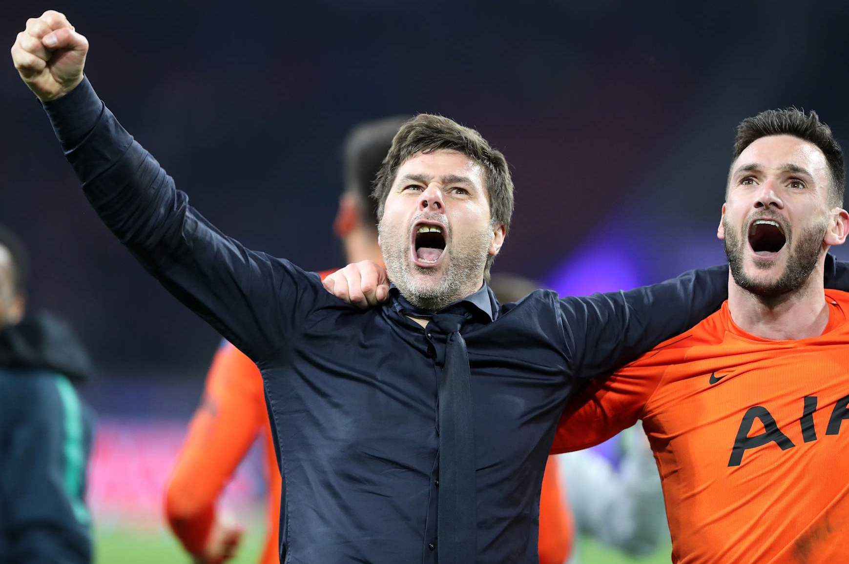 AMSTERDAM, NETHERLANDS - MAY 08: Tottenham manager Mauricio Pochettino and Tottenham goalkeeper Hugo Lloris celebrate after the UEFA Champions League Semi Final second leg match between Ajax and Tottenham Hotspur at the Johan Cruyff Arena on May 8, 2019 in Amsterdam, Netherlands. (Photo by Charlotte Wilson/Offside/Getty Images)