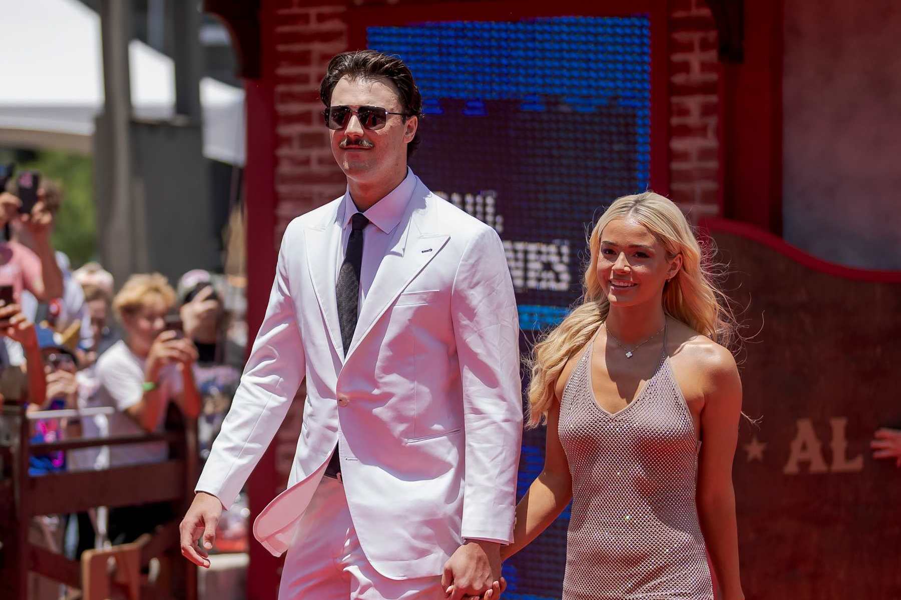ARLINGTON, TX - JULY 16: Paul Skenes #30 of the Pittsburgh Pirates, and Livvy Dunne pose for a photo during the 2024 All-Star Red Carpet Show presented by Frutitas Agua Fresca at Globe Life Field North Plaza on Tuesday, July 16, 2024 in Arlington, Texas. (Photo by Matt Dirksen/Chicago Cubs/Getty Images)