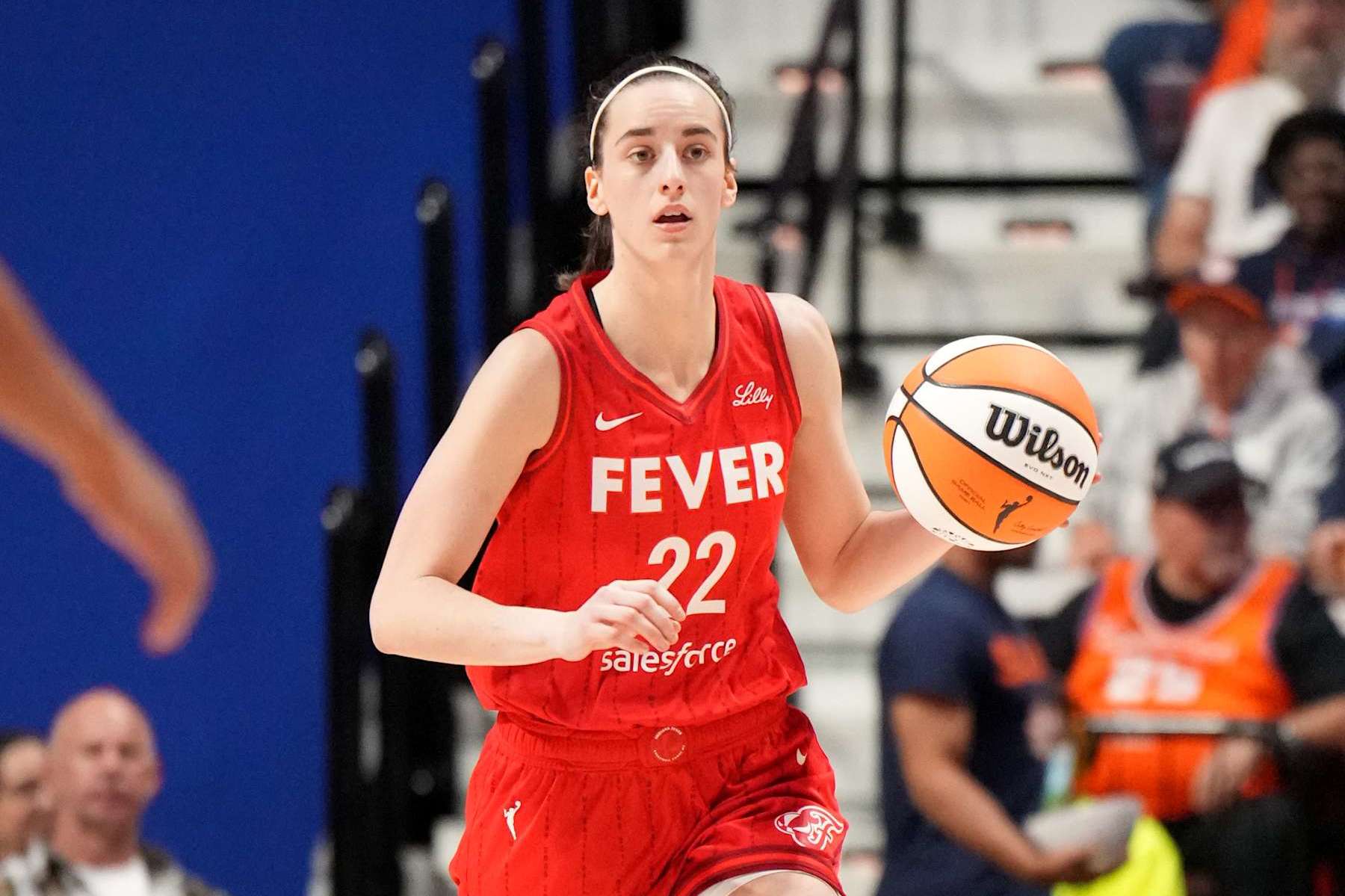UNCASVILLE, CT - SEPTEMBER 25: c#22 of the Indiana Fever dribbles the ball during the game against the Connecticut Sun during Round one Game two of the 2024 WNBA Playoffs on September 25, 2024 at the Mohegan Sun Arena in Uncasville, Connecticut. NOTE TO USER: User expressly acknowledges and agrees that, by downloading and or using this photograph, User is consenting to the terms and conditions of the Getty Images License Agreement. Mandatory Copyright Notice: Copyright 2024 NBAE (Photo by Jesse D. Garrabrant/NBAE via Getty Images)