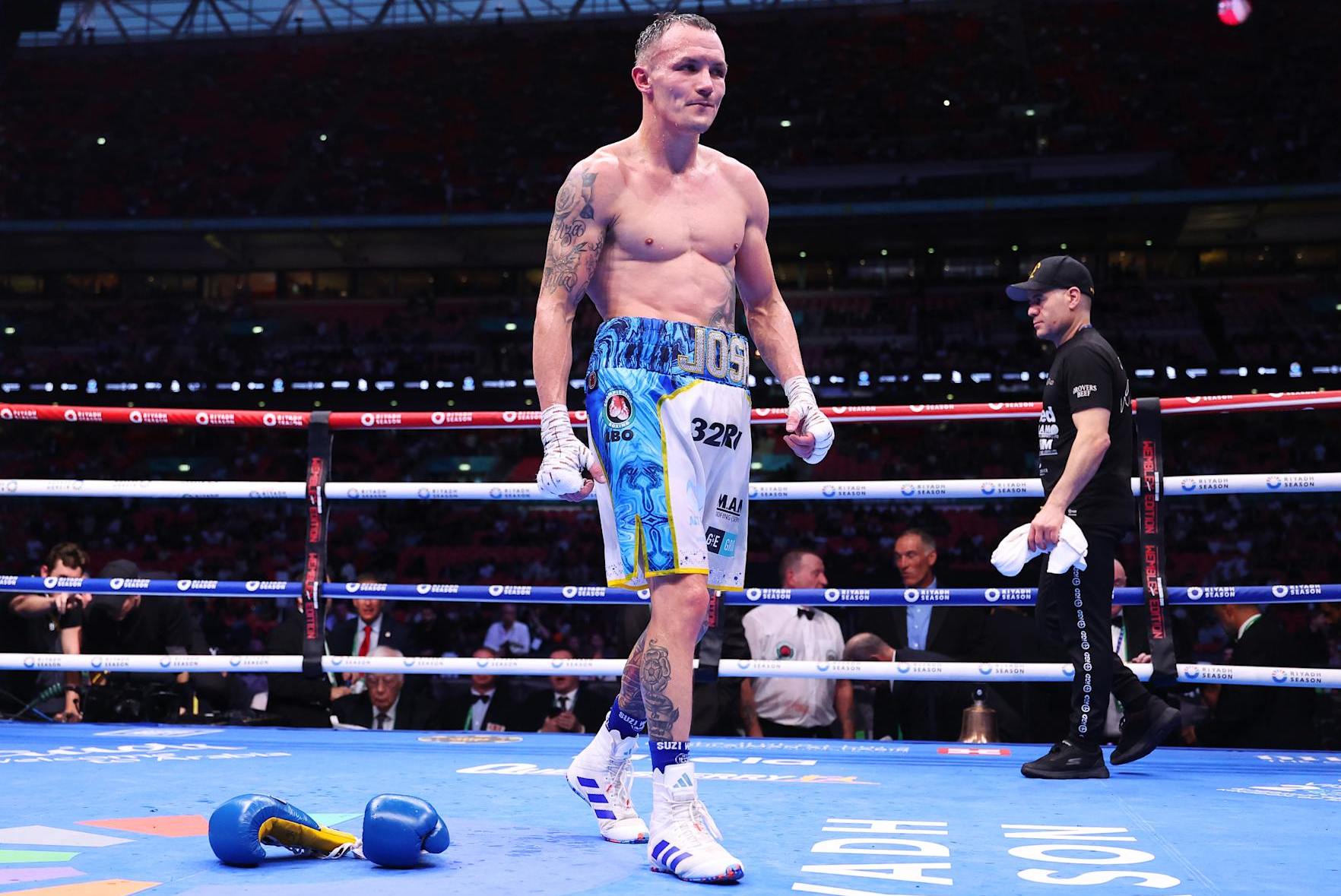 LONDON, ENGLAND - SEPTEMBER 21: Josh Warrington walks out of the ring after throwing his gloves down as he reacts to defeat to Anthony Cacace (not pictured) in the IBO World Super Featherweight Title fight between Anthony Cacace and Josh Warrington , on the Riyadh Season - Wembley Edition card at Wembley Stadium on September 21, 2024 in London, England. (Photo by Richard Pelham/Getty Images)