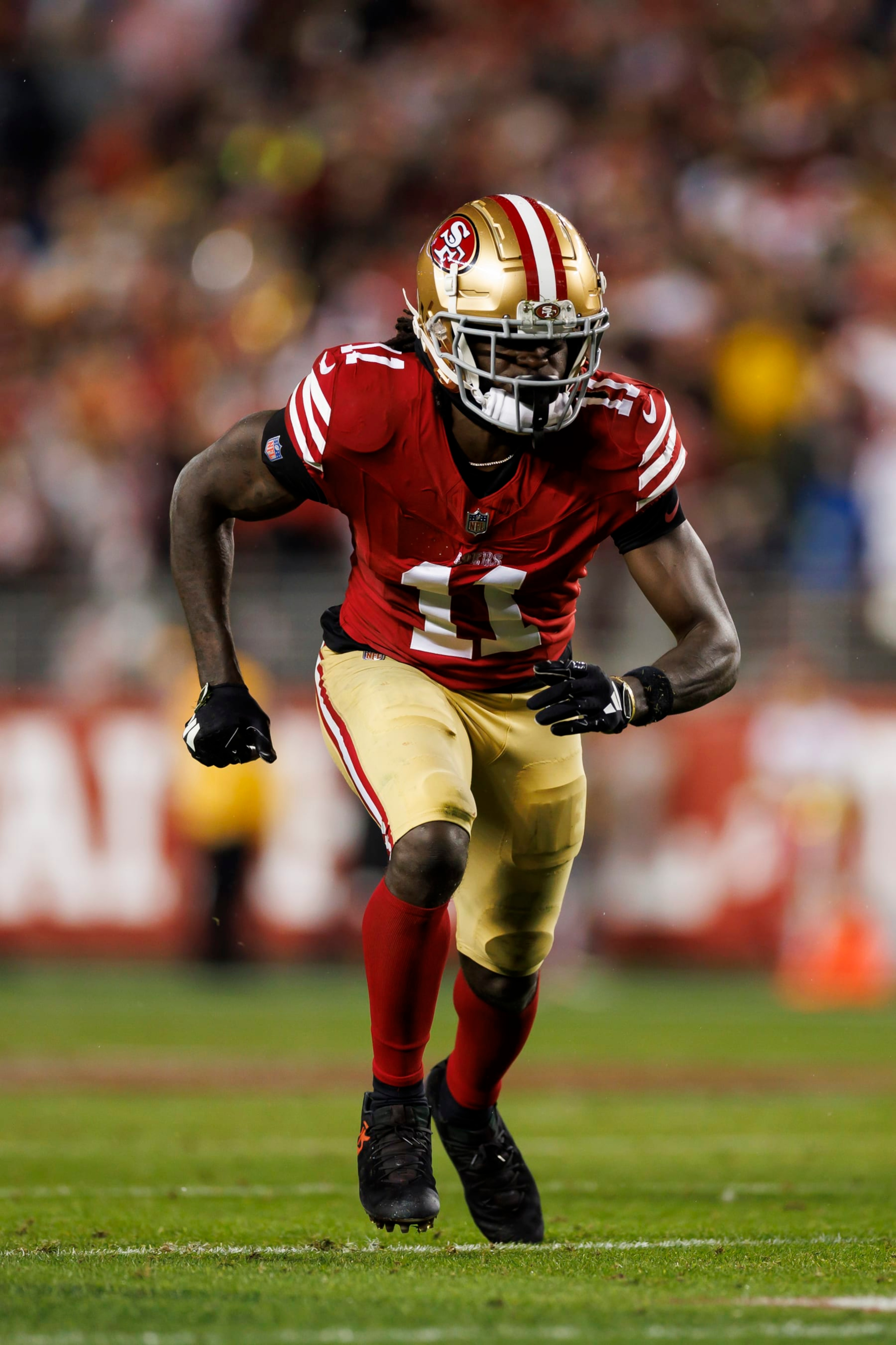 SANTA CLARA, CALIFORNIA - JANUARY 20: Brandon Aiyuk #11 of the San Francisco 49ers runs a route during an NFC divisional round playoff football game against the Green Bay Packers at Levi's Stadium on January 20, 2024 in Santa Clara, California. (Photo by Ryan Kang/Getty Images) SANTA CLARA, CALIFORNIA - JANUARY 20: Brandon Aiyuk #11 of the San Francisco 49ers runs a route during an NFC divisional round playoff football game against the Green Bay Packers at Levi's Stadium on January 20, 2024 in Santa Clara, California. (Photo by Ryan Kang/Getty Images)