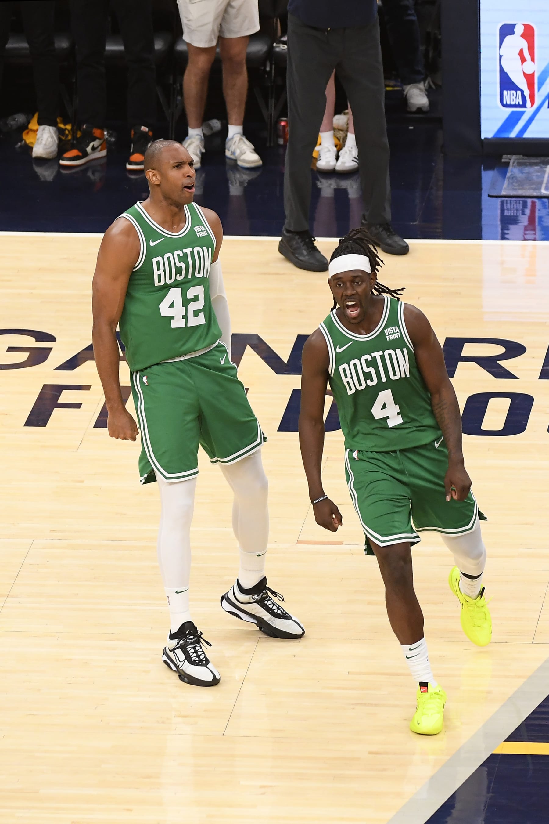 INDIANAPOLIS, IN - MAY 25:  Al Horford #42 of the Boston Celtics and Jrue Holiday #4 of the Boston Celtics celebrates during the game against the Indiana Pacers during Game 3 of the Eastern Conference Finals of the 2024 NBA Playoffs  on May 25, 2024 at Gainbridge Fieldhouse in Indianapolis, Indiana. NOTE TO USER: User expressly acknowledges and agrees that, by downloading and or using this Photograph, user is consenting to the terms and conditions of the Getty Images License Agreement. Mandatory Copyright Notice: Copyright 2024 NBAE (Photo by Brian Babineau/NBAE via Getty Images)