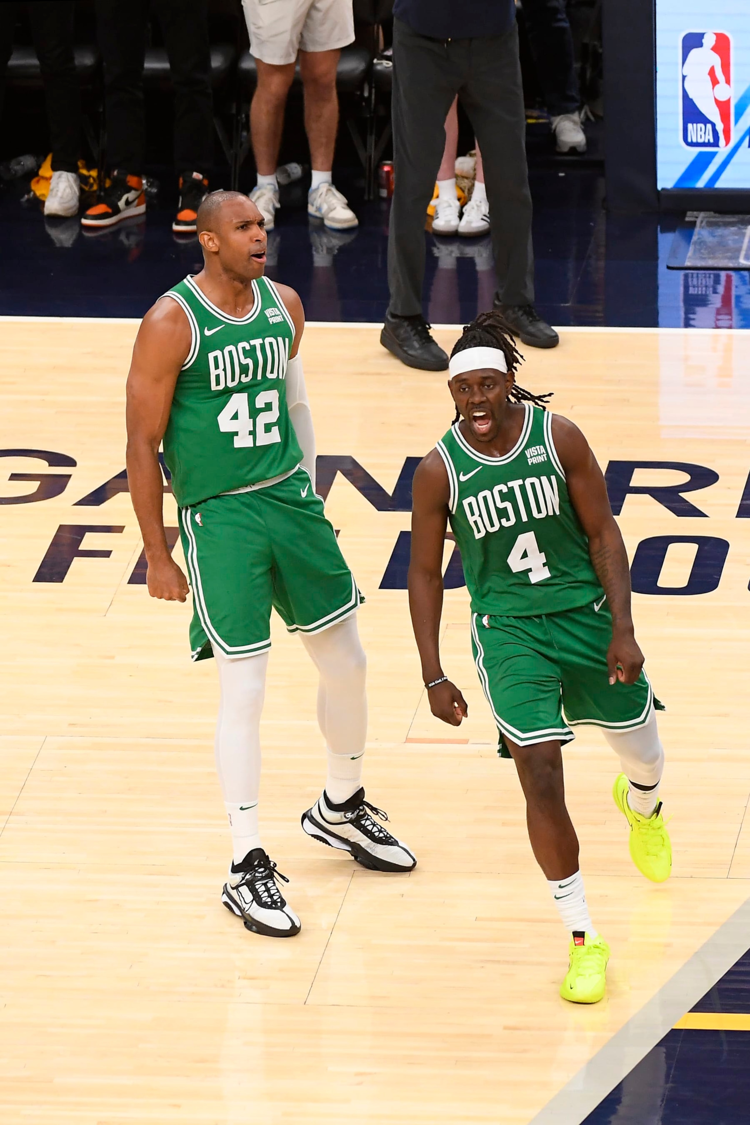 INDIANAPOLIS, IN - MAY 25:  Al Horford #42 of the Boston Celtics and Jrue Holiday #4 of the Boston Celtics celebrates during the game against the Indiana Pacers during Game 3 of the Eastern Conference Finals of the 2024 NBA Playoffs  on May 25, 2024 at Gainbridge Fieldhouse in Indianapolis, Indiana. NOTE TO USER: User expressly acknowledges and agrees that, by downloading and or using this Photograph, user is consenting to the terms and conditions of the Getty Images License Agreement. Mandatory Copyright Notice: Copyright 2024 NBAE (Photo by Brian Babineau/NBAE via Getty Images)