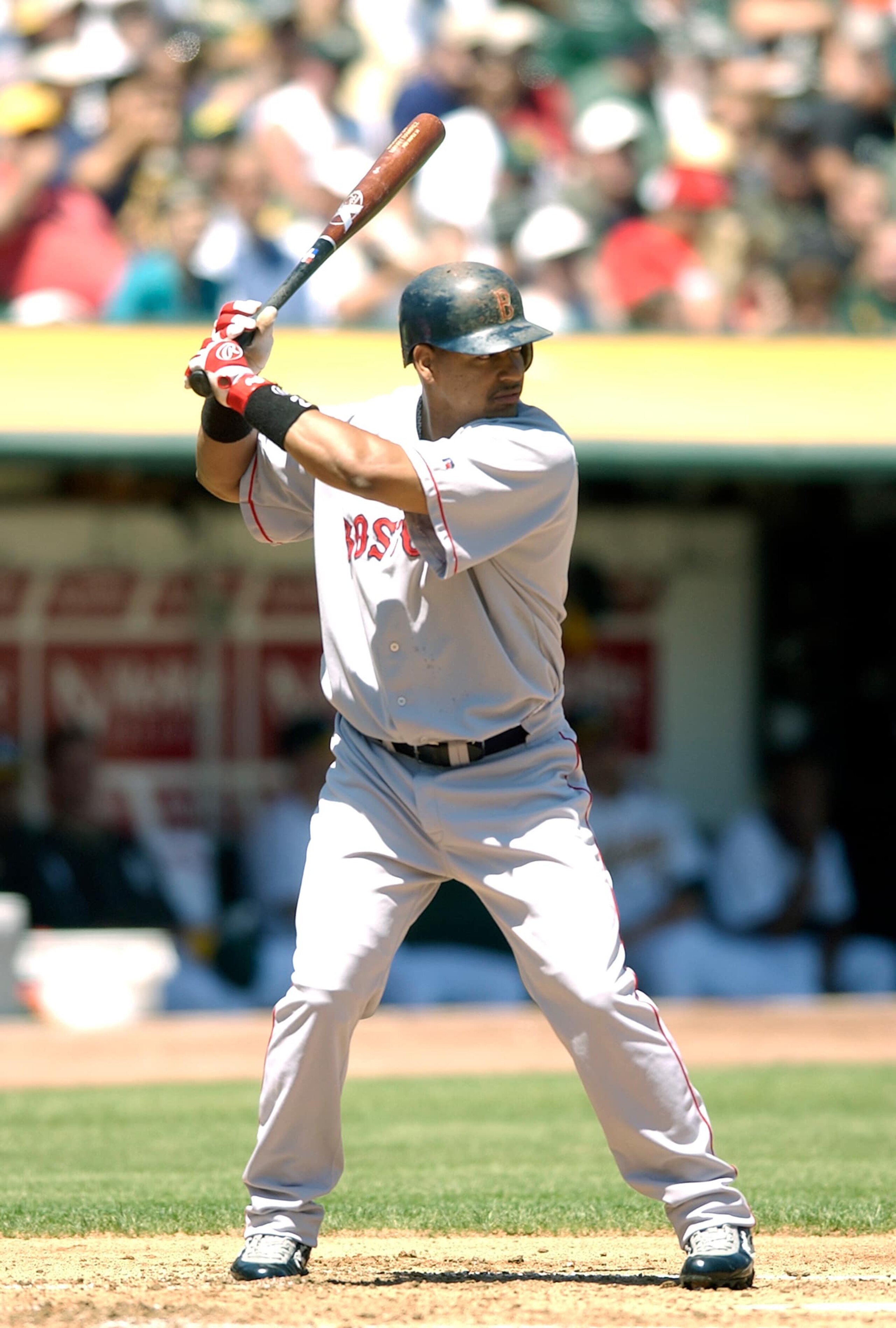 OAKLAND, CA - AUGUST 15: Manny Ramirez #24 of the Boston Red Sox bats against the Oakland Athletics during a Major League Baseball game on August 15, 2003 at the Oakland-Alameda County Coliseum in Oakland, California. Ramirez played for the Red Sox from 2001-08. (Photo by Focus on Sport/Getty Images)