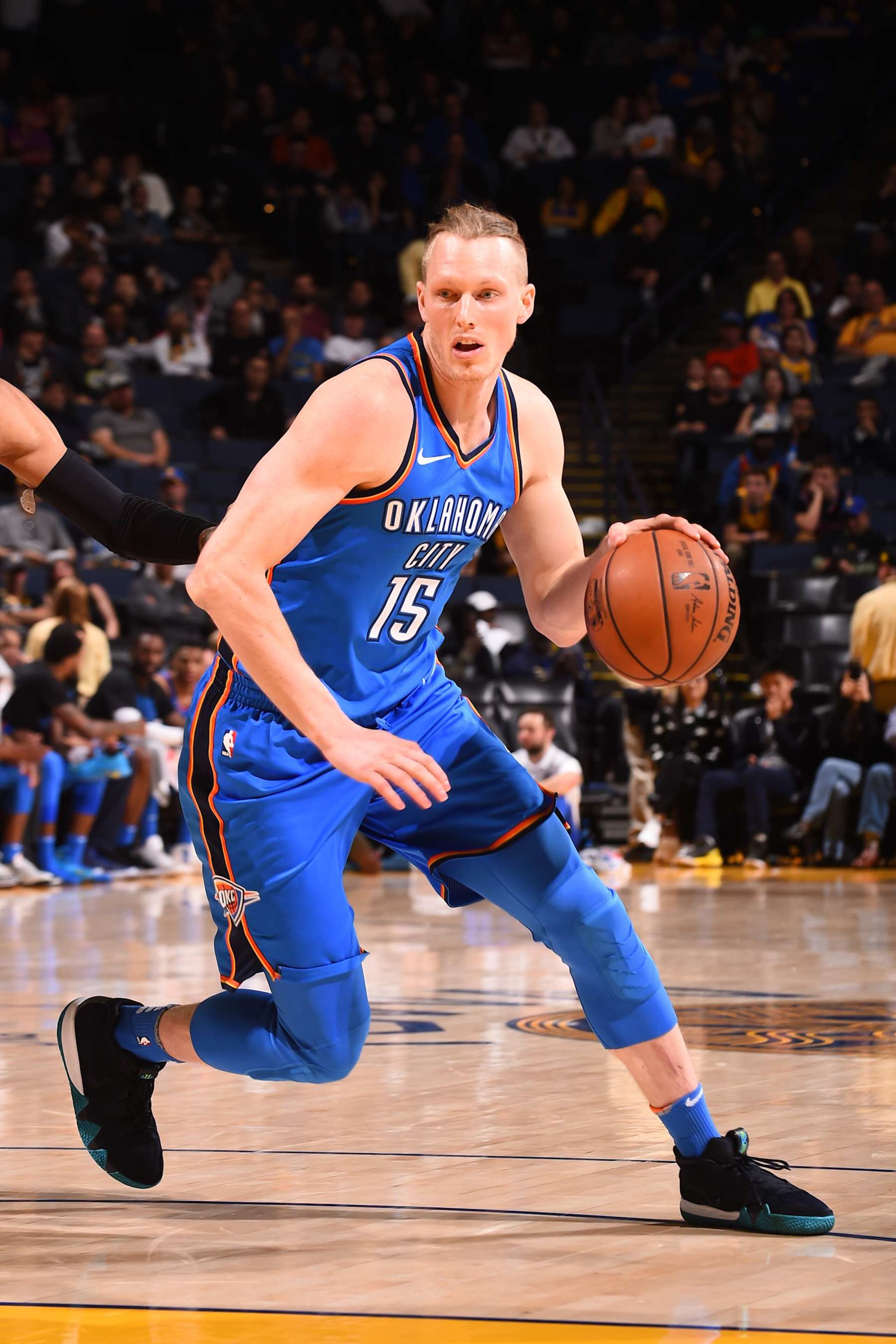 OAKLAND, CA - FEBRUARY 6:  Kyle Singler #15 of the Oklahoma City Thunder handles the ball against the Golden State Warriors on February 6, 2018 at ORACLE Arena in Oakland, California. NOTE TO USER: User expressly acknowledges and agrees that, by downloading and or using this photograph, user is consenting to the terms and conditions of Getty Images License Agreement. Mandatory Copyright Notice: Copyright 2018 NBAE (Photo by Noah Graham/NBAE via Getty Images)