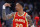 ATLANTA, GEORGIA - APRIL 22: John Collins #20 of the Atlanta Hawks celebrates a three pointer against the Miami Heat during the second quarter in Game Three of the Eastern Conference First Round at State Farm Arena on April 22, 2022 in Atlanta, Georgia. NOTE TO USER: User expressly acknowledges and agrees that, by downloading and or using this photograph, User is consenting to the terms and conditions of the Getty Images License Agreement.  (Photo by Kevin C. Cox/Getty Images)