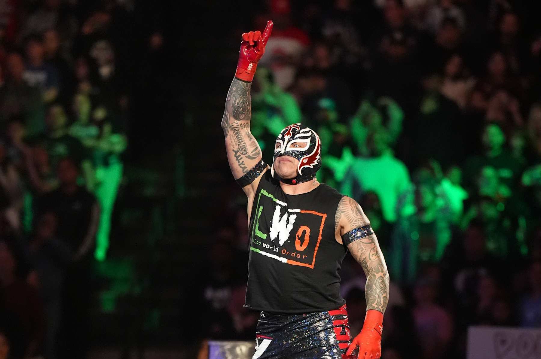 DALLAS, TEXAS - JANUARY 20: Rey Mysterio makes an entrance during WWE RAW at American Airlines Center on January 20, 2025 in Dallas, Texas. (Photo by WWE/Getty Images)