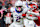 LAS VEGAS, NEVADA - OCTOBER 25: Ashton Jeanty #2 of the Boise State Broncos stiff arms Jett Elad #9 of the UNLV Rebels during the fourth quarter of a game at Allegiant Stadium on October 25, 2024 in Las Vegas, Nevada. (Photo by Ian Maule/Getty Images)