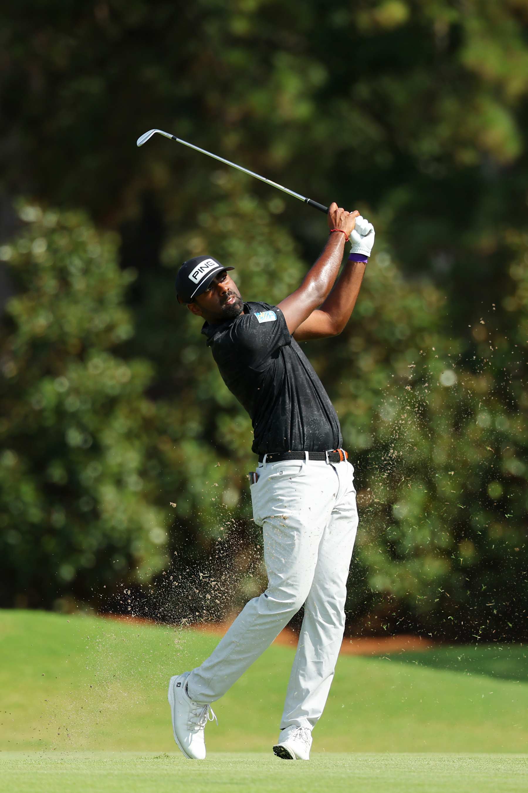 ATLANTA, GEORGIA - AUGUST 31: Sahith Theegala of United States plays a shot on the seventh hole during the third round of the TOUR Championship at East Lake Golf Club on August 31, 2024 in Atlanta, Georgia. (Photo by Kevin C. Cox/Getty Images)