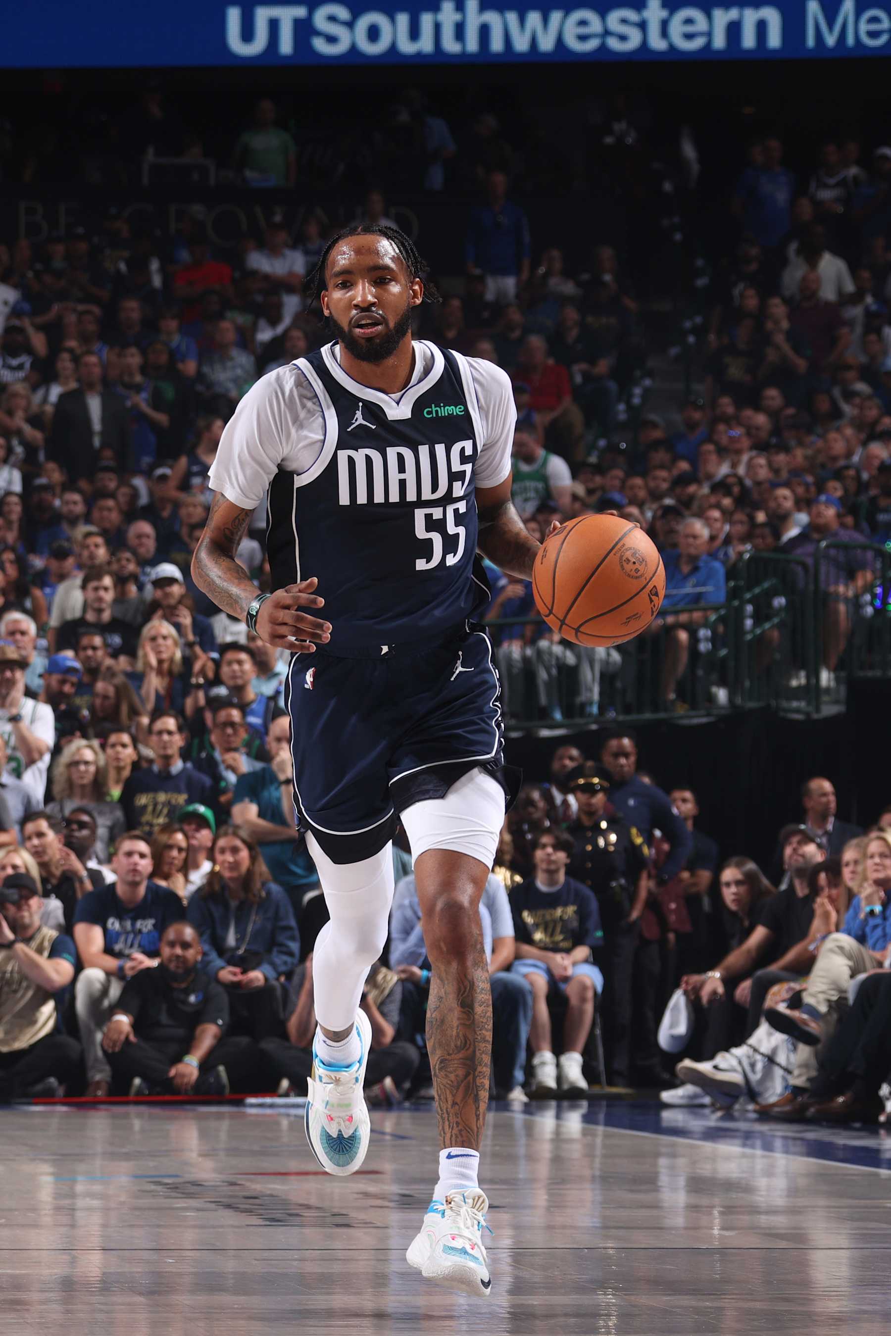 DALLAS, TX - JUNE 14: Derrick Jones Jr. #55 of the Dallas Mavericks dribbles the ball during the game against the Boston Celtics during Game 4 of the 2024 NBA Finals on June 14, 2024 at the American Airlines Center in Dallas, Texas. NOTE TO USER: User expressly acknowledges and agrees that, by downloading and or using this photograph, User is consenting to the terms and conditions of the Getty Images License Agreement. Mandatory Copyright Notice: Copyright 2024 NBAE (Photo by Nathaniel S. Butler/NBAE via Getty Images)