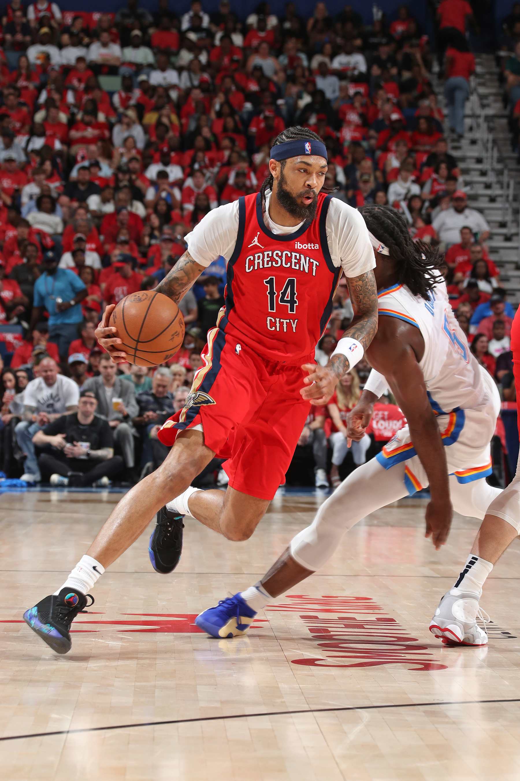NEW ORLEANS, LA - APRIL 27: Brandon Ingram #14 of the New Orleans Pelicans handles the ball during the game against the Oklahoma City Thunder during Round 1 Game 3 of the 2024 NBA Playoffs on April 27, 2024 at the Smoothie King Center in New Orleans, Louisiana. NOTE TO USER: User expressly acknowledges and agrees that, by downloading and or using this Photograph, user is consenting to the terms and conditions of the Getty Images License Agreement. Mandatory Copyright Notice: Copyright 2024 NBAE (Photo by Layne Murdoch Jr./NBAE via Getty Images)