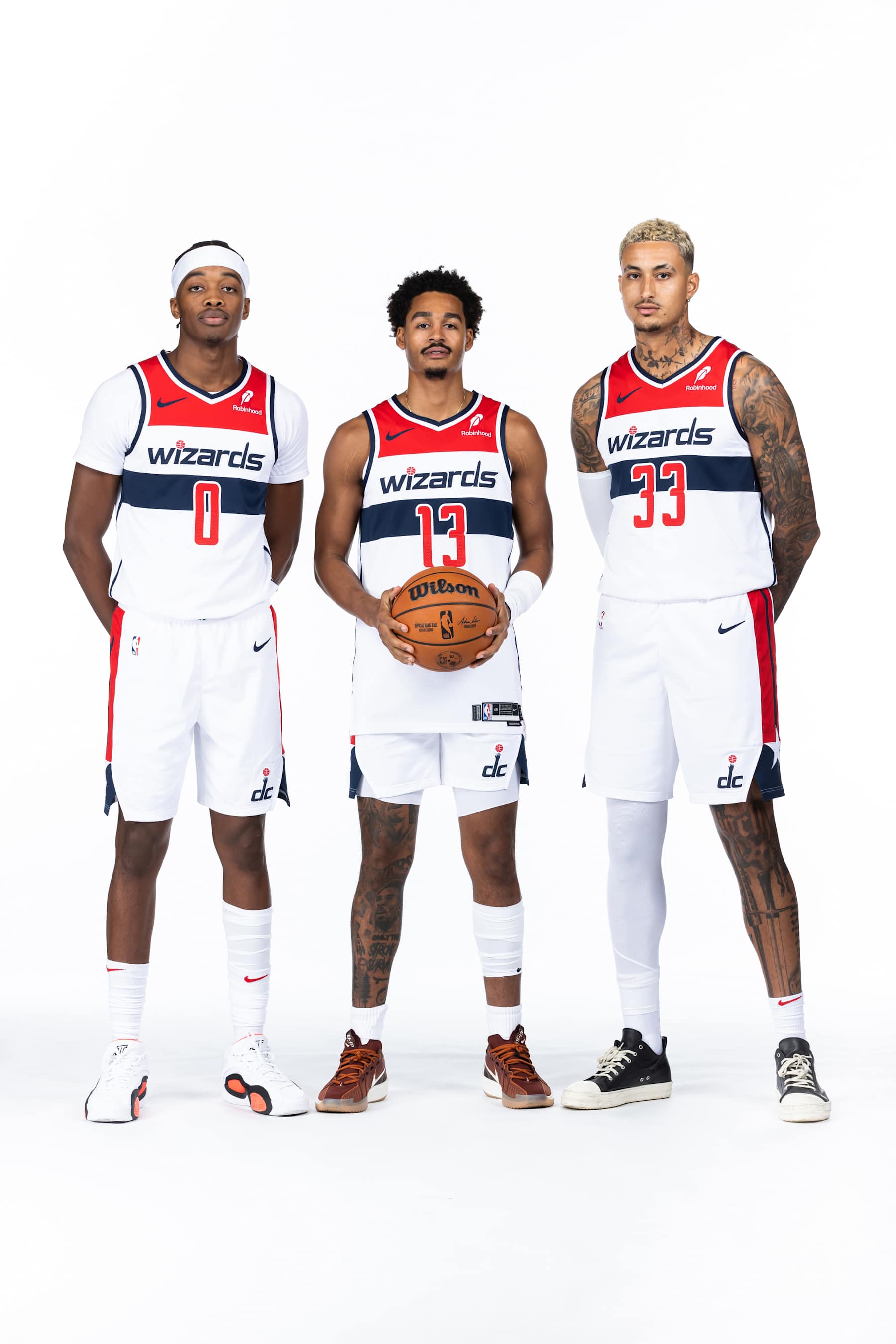 WASHINGTON, D.C. - SEPTEMBER 30: Bilal Coulibaly #0, Jordan Poole #13 and Kyle Kuzma #33 of the Washington Wizards of the Washington Wizards poses for a portrait during NBA media day on September 30, 2024 at Entertainment and Sports Arena in Washington, D.C. NOTE TO USER: User expressly acknowledges and agrees that, by downloading and or using this photograph, User is consenting to the terms and conditions of the Getty Images License Agreement. Mandatory Copyright Notice: Copyright 2024 NBAE (Photo by Stephen Gosling/NBAE via Getty Images)