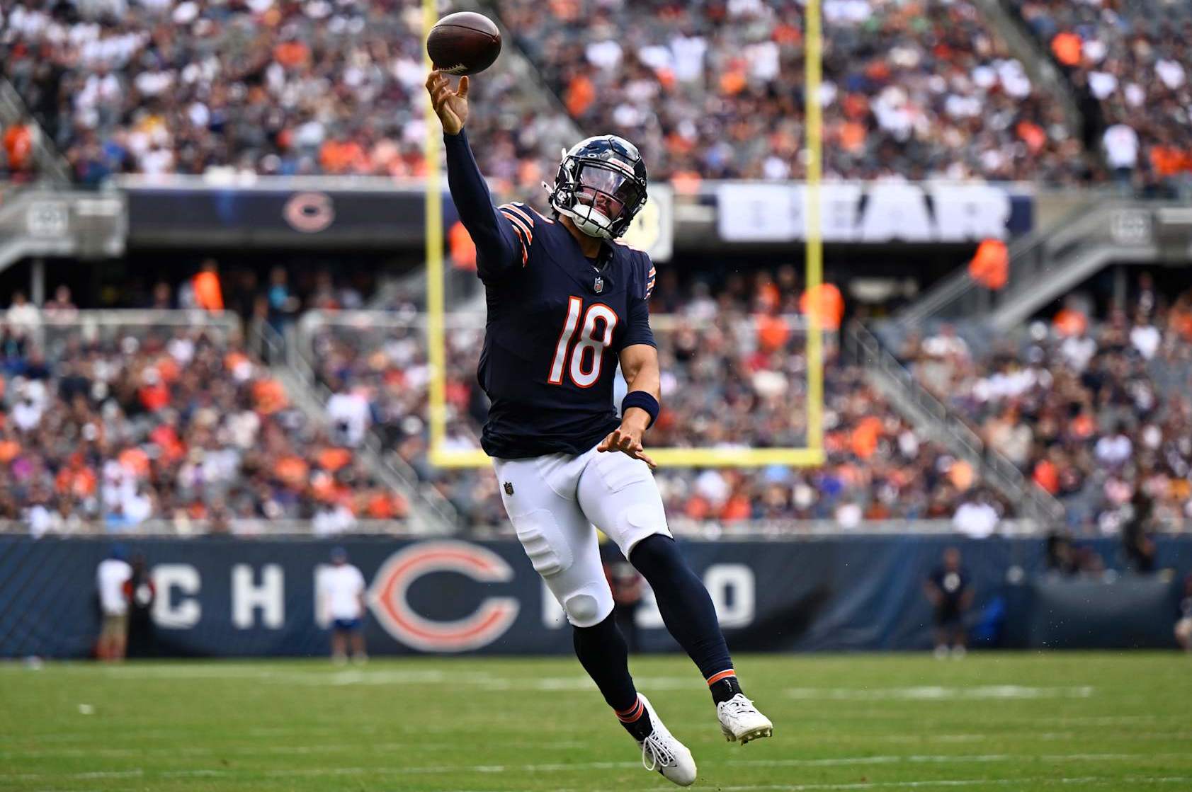 CHICAGO, ILLINOIS - AUGUST 17: Caleb Williams #18 of the Chicago Bears passes in the first half of a preseason game against the Cincinnati Bengals at Soldier Field on August 17, 2024 in Chicago, Illinois. (Photo by Quinn Harris/Getty Images)