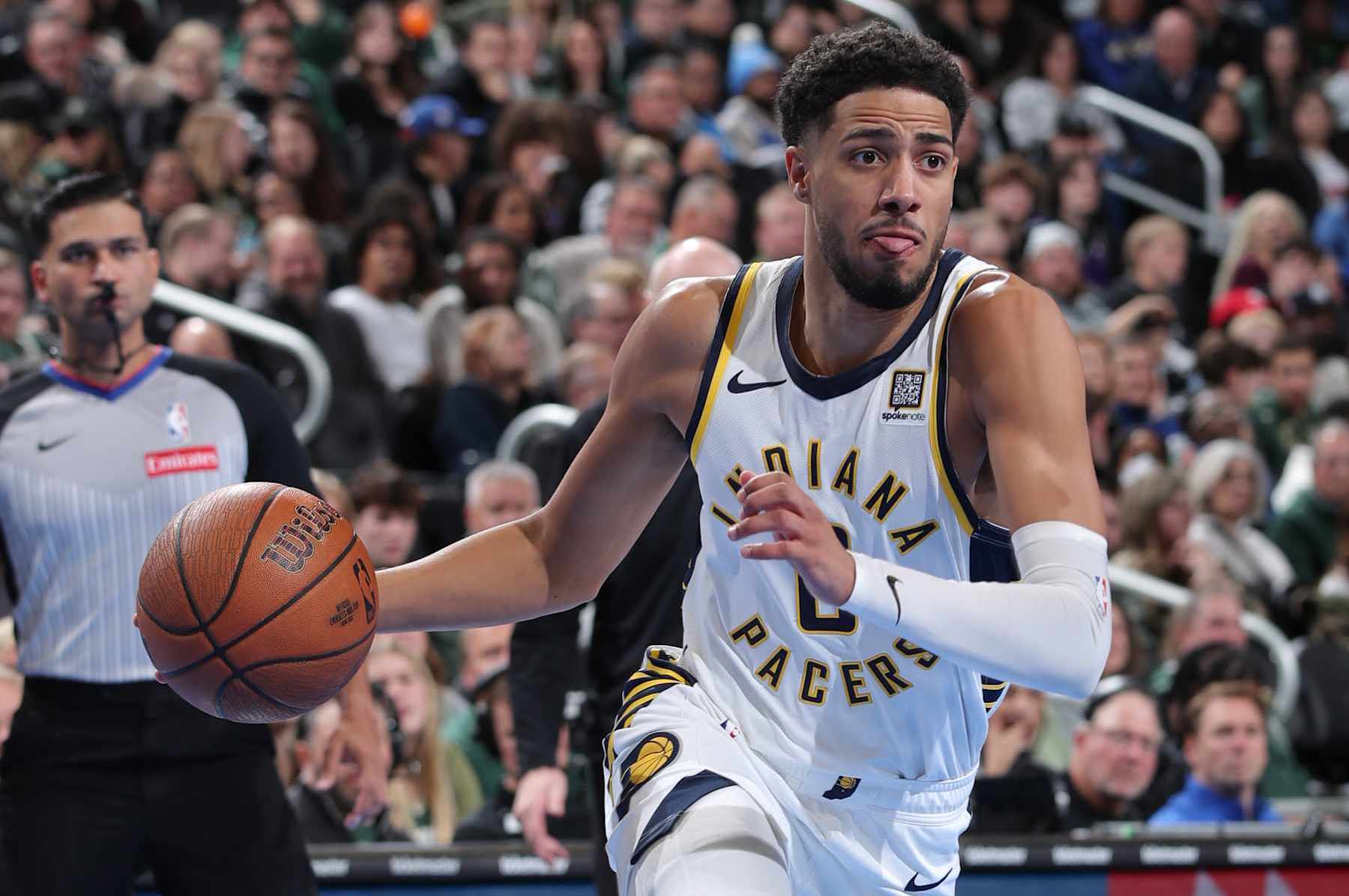 MILWAUKEE, WI - NOVEMBER 22:  Tyrese Haliburton #0 of the Indiana Pacers dribbles the ball during the game against the Milwaukee Bucks during a Emirates NBA Cup on November 22, 2024 at Fiserv Forum Center in Milwaukee, Wisconsin. NOTE TO USER: User expressly acknowledges and agrees that, by downloading and or using this Photograph, user is consenting to the terms and conditions of the Getty Images License Agreement. Mandatory Copyright Notice: Copyright 2024 NBAE (Photo by Gary Dineen/NBAE via Getty Images).