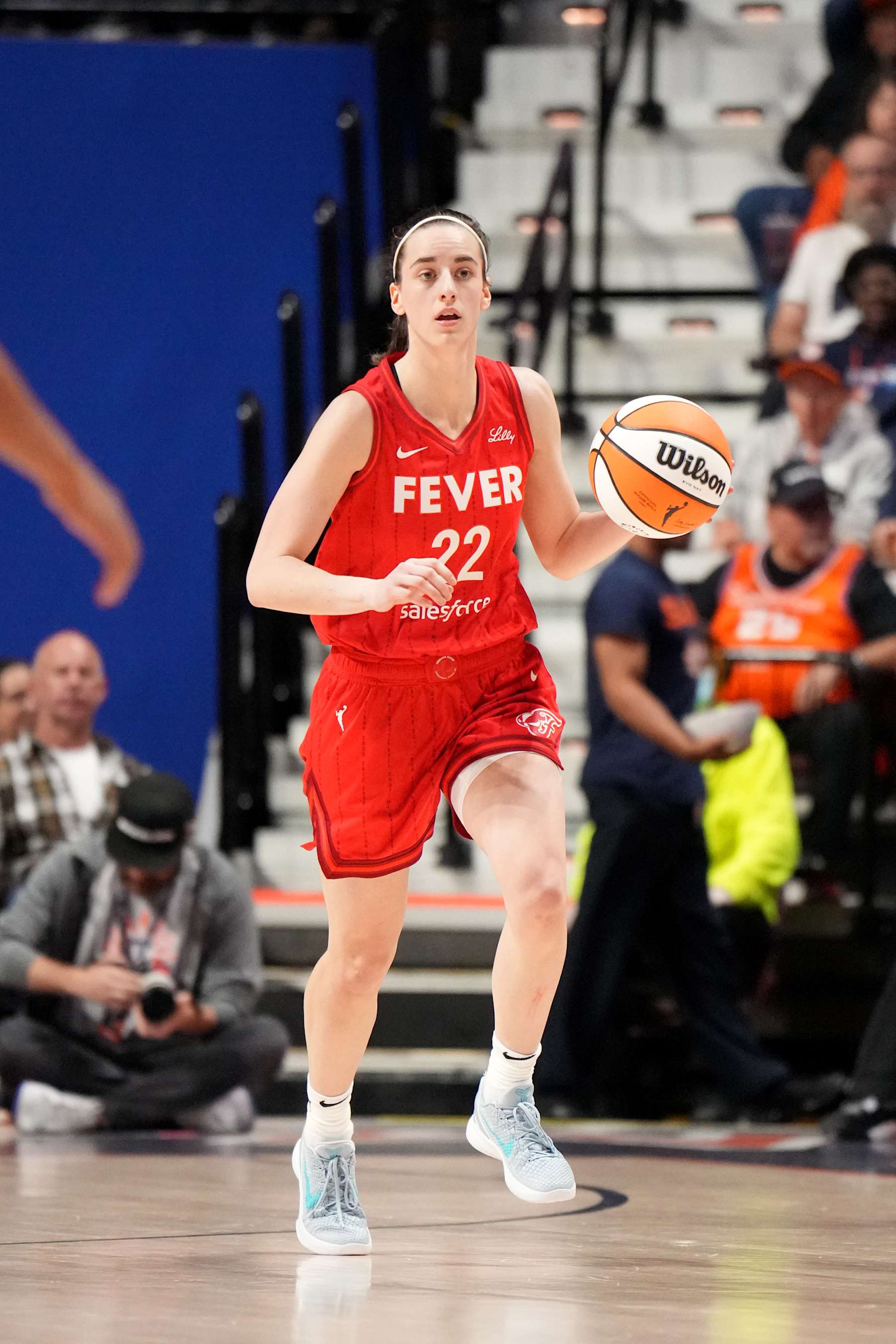 UNCASVILLE, CT - SEPTEMBER 25: c#22 of the Indiana Fever dribbles the ball during the game against the Connecticut Sun during Round one Game two of the 2024 WNBA Playoffs on September 25, 2024 at the Mohegan Sun Arena in Uncasville, Connecticut. NOTE TO USER: User expressly acknowledges and agrees that, by downloading and or using this photograph, User is consenting to the terms and conditions of the Getty Images License Agreement. Mandatory Copyright Notice: Copyright 2024 NBAE (Photo by Jesse D. Garrabrant/NBAE via Getty Images)