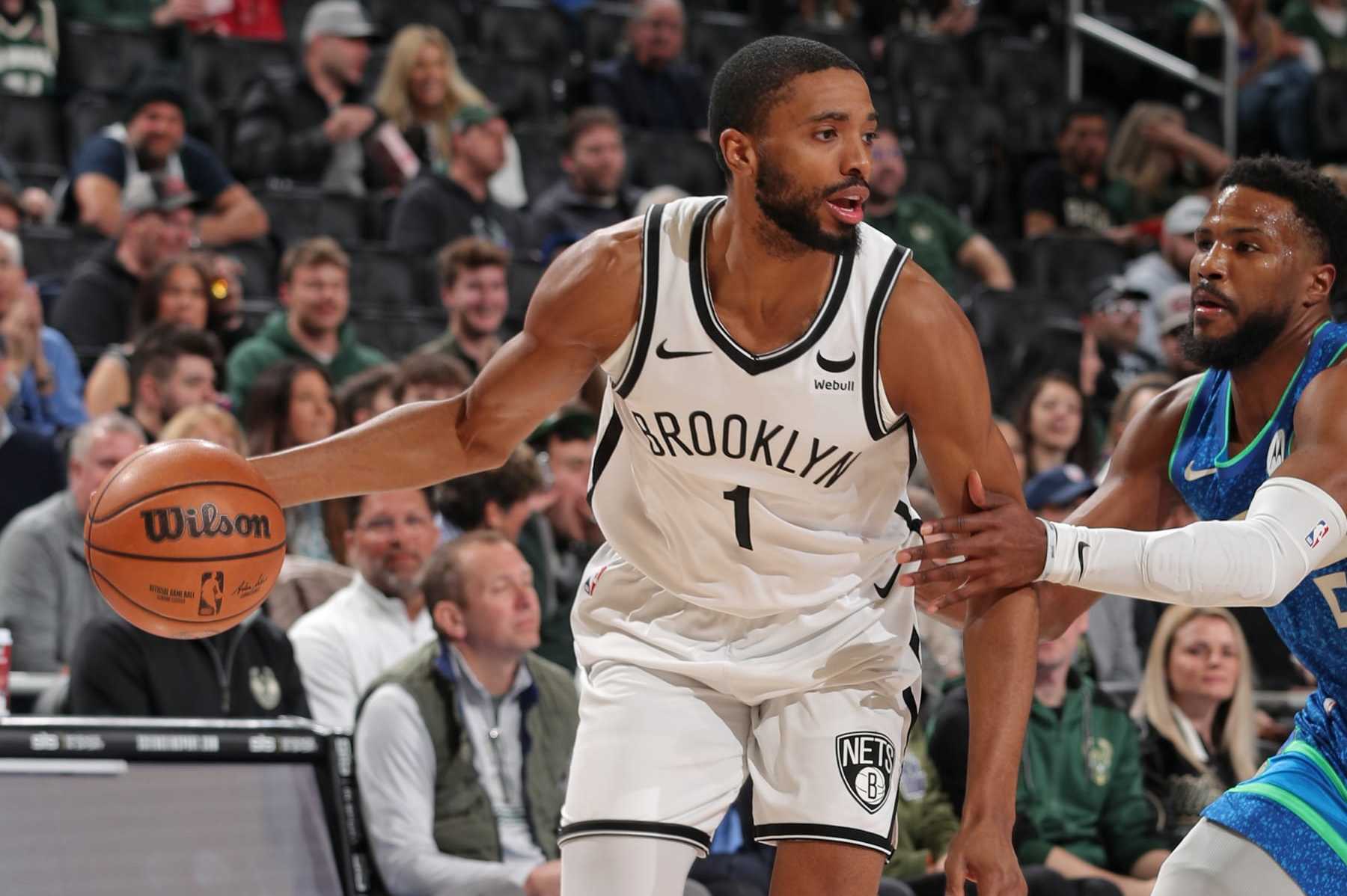 MILWAUKEE, WI - MARCH 21: Mikal Bridges #1 of the Brooklyn Nets handles the ball during the game against the Milwaukee Bucks on March 21, 2024 at the Fiserv Forum Center in Milwaukee, Wisconsin. NOTE TO USER: User expressly acknowledges and agrees that, by downloading and or using this Photograph, user is consenting to the terms and conditions of the Getty Images License Agreement. Mandatory Copyright Notice: Copyright 2024 NBAE (Photo by Gary Dineen/NBAE via Getty Images).