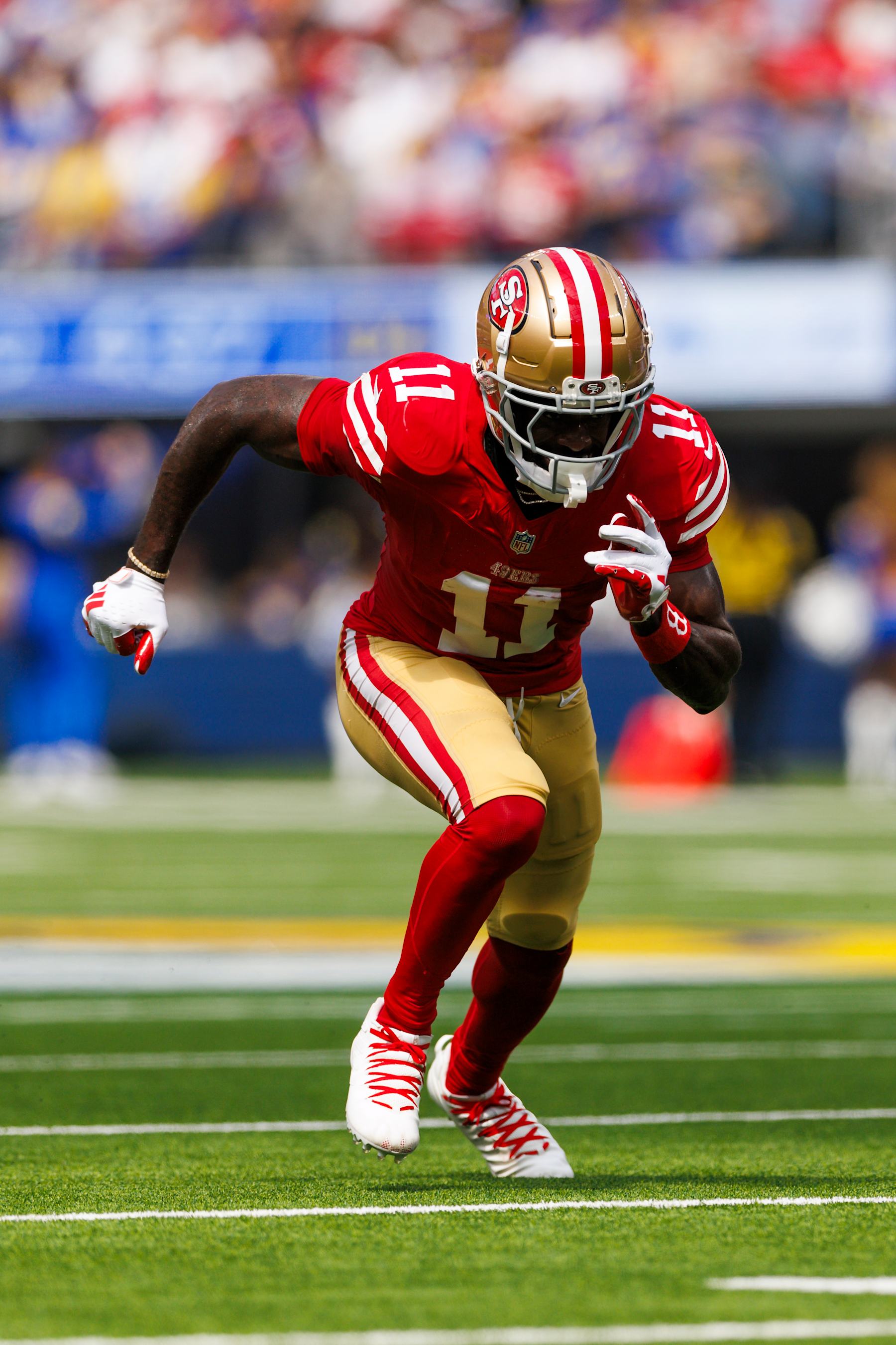INGLEWOOD, CALIFORNIA - SEPTEMBER 22: Brandon Aiyuk #11 of the San Francisco 49ers runs a route during the first half against the Los Angeles Rams at SoFi Stadium on September 22, 2024 in Inglewood, California. (Photo by Ric Tapia/Getty Images)