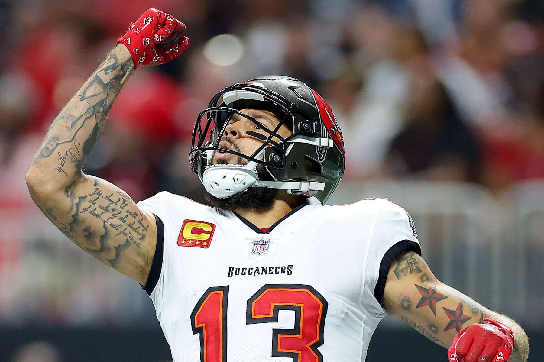 ATLANTA, GEORGIA - OCTOBER 03: Mike Evans #13 of the Tampa Bay Buccaneers celebrates after scoring a touchdown against the Atlanta Falcons during the second quarter at Mercedes-Benz Stadium on October 03, 2024 in Atlanta, Georgia. (Photo by Kevin C. Cox/Getty Images)