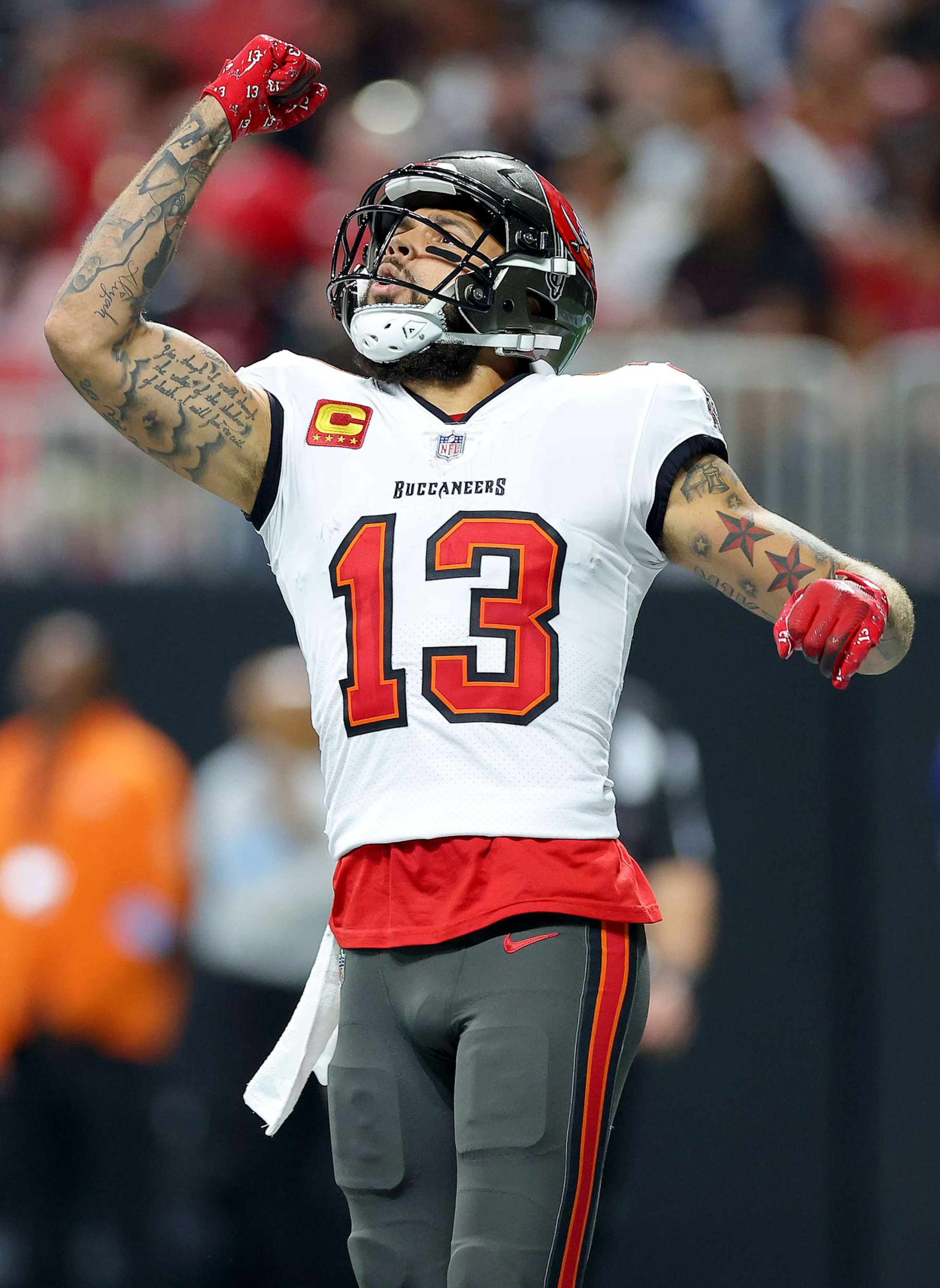 ATLANTA, GEORGIA - OCTOBER 03: Mike Evans #13 of the Tampa Bay Buccaneers celebrates after scoring a touchdown against the Atlanta Falcons during the second quarter at Mercedes-Benz Stadium on October 03, 2024 in Atlanta, Georgia. (Photo by Kevin C. Cox/Getty Images)