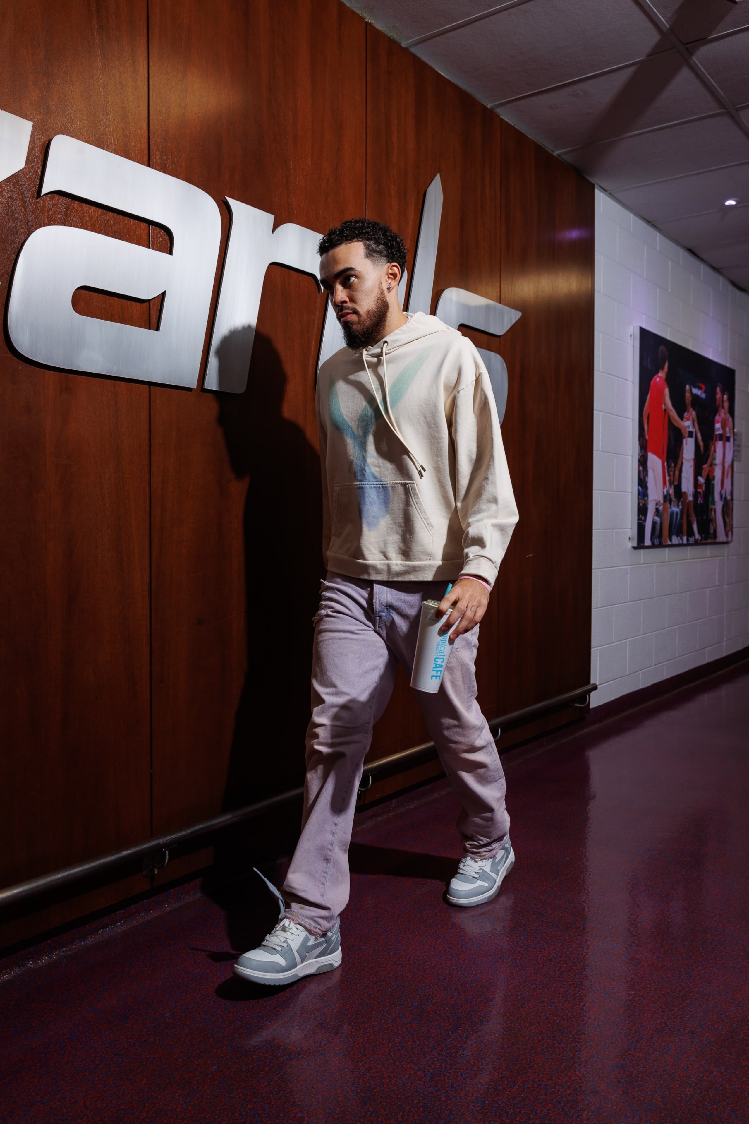 WASHINGTON, DC -  FEBRUARY 4: Tyus Jones #5 of the Washington Wizards arrives to the arena before the game against the Phoenix Suns on February 4, 2024 at Capital One Arena in Washington, DC. NOTE TO USER: User expressly acknowledges and agrees that, by downloading and or using this Photograph, user is consenting to the terms and conditions of the Getty Images License Agreement. Mandatory Copyright Notice: Copyright 2024 NBAE (Photo by Kenny Giarla/NBAE via Getty Images)