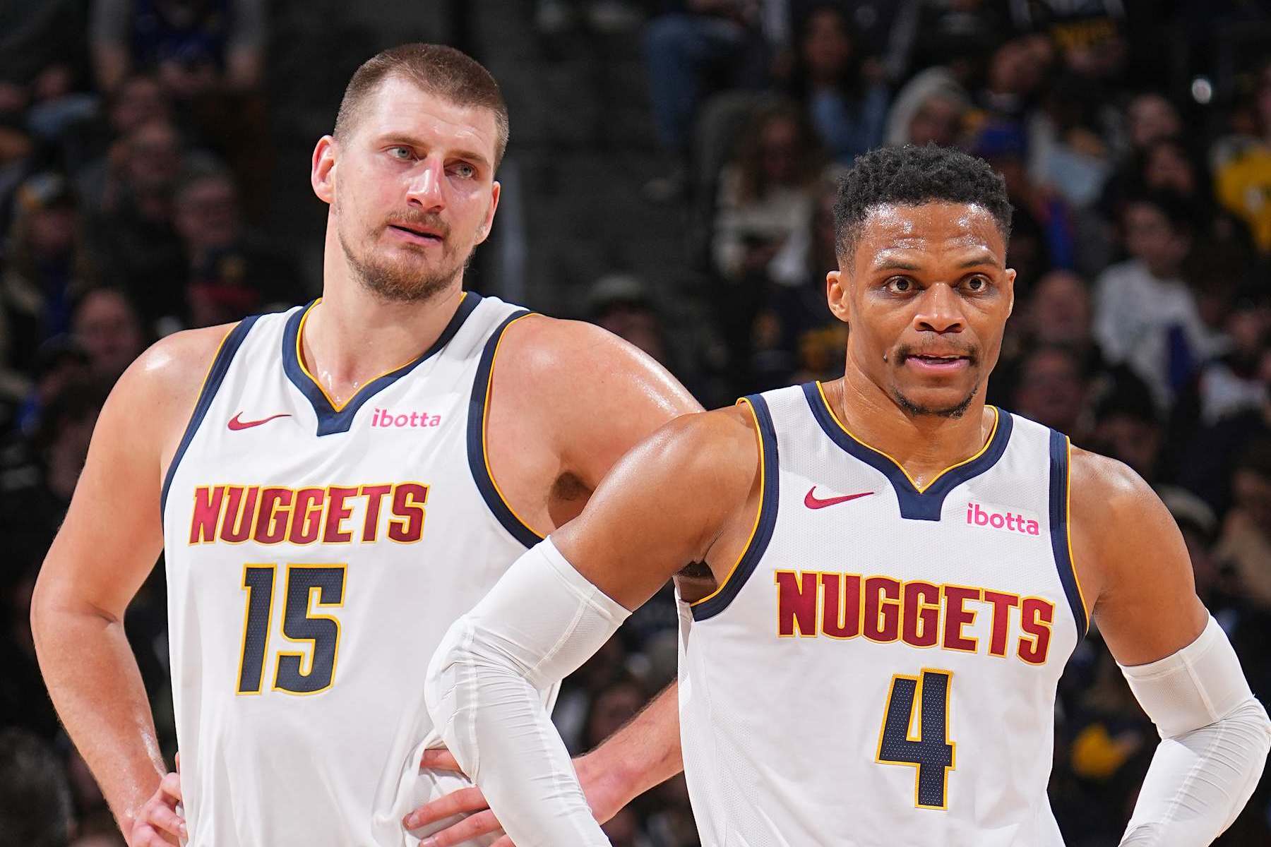 DENVER, CO - JANUARY 3: Nikola Jokic #15 and Russell Westbrook #4 of the Denver Nuggets looks on during the game against the San Antonio Spurs on January 3, 2025 at Ball Arena in Denver, Colorado. NOTE TO USER: User expressly acknowledges and agrees that, by downloading and/or using this Photograph, user is consenting to the terms and conditions of the Getty Images License Agreement. Mandatory Copyright Notice: Copyright 2025 NBAE (Photo by Bart Young/NBAE via Getty Images)