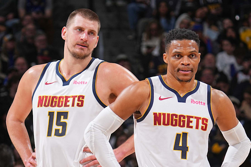 DENVER, CO - JANUARY 3: Nikola Jokic #15 and Russell Westbrook #4 of the Denver Nuggets looks on during the game against the San Antonio Spurs on January 3, 2025 at Ball Arena in Denver, Colorado. NOTE TO USER: User expressly acknowledges and agrees that, by downloading and/or using this Photograph, user is consenting to the terms and conditions of the Getty Images License Agreement. Mandatory Copyright Notice: Copyright 2025 NBAE (Photo by Bart Young/NBAE via Getty Images)