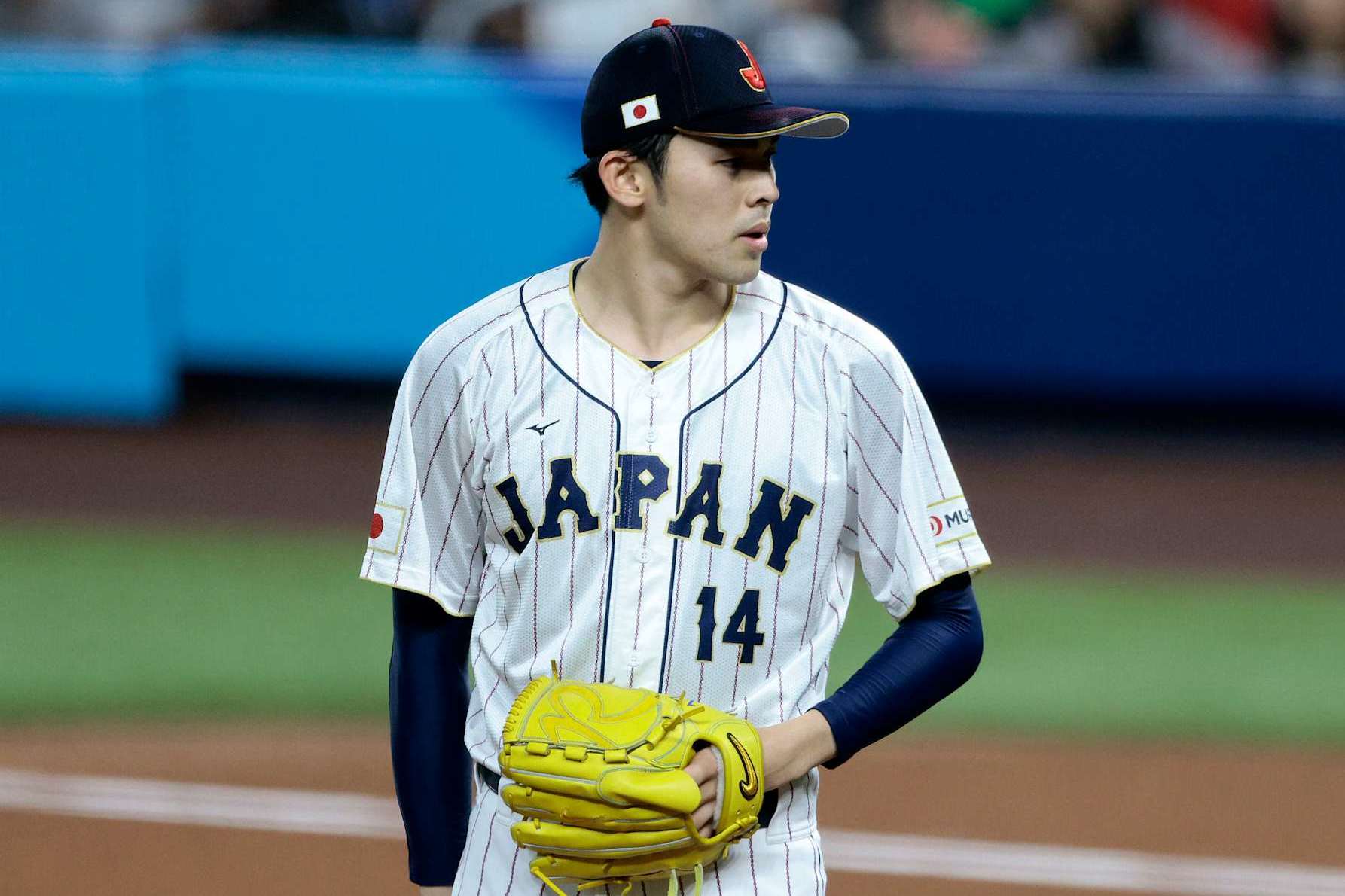 MIAMI, FL - MARCH 20: Roki Sasaki #14 of Team Japan pitches during the 2023 World Baseball Classic Semifinal game against Team Mexico at loanDepot Park on March 20, 2023 in Miami, Florida. (Photo by Christopher Pasatieri/Getty Images)