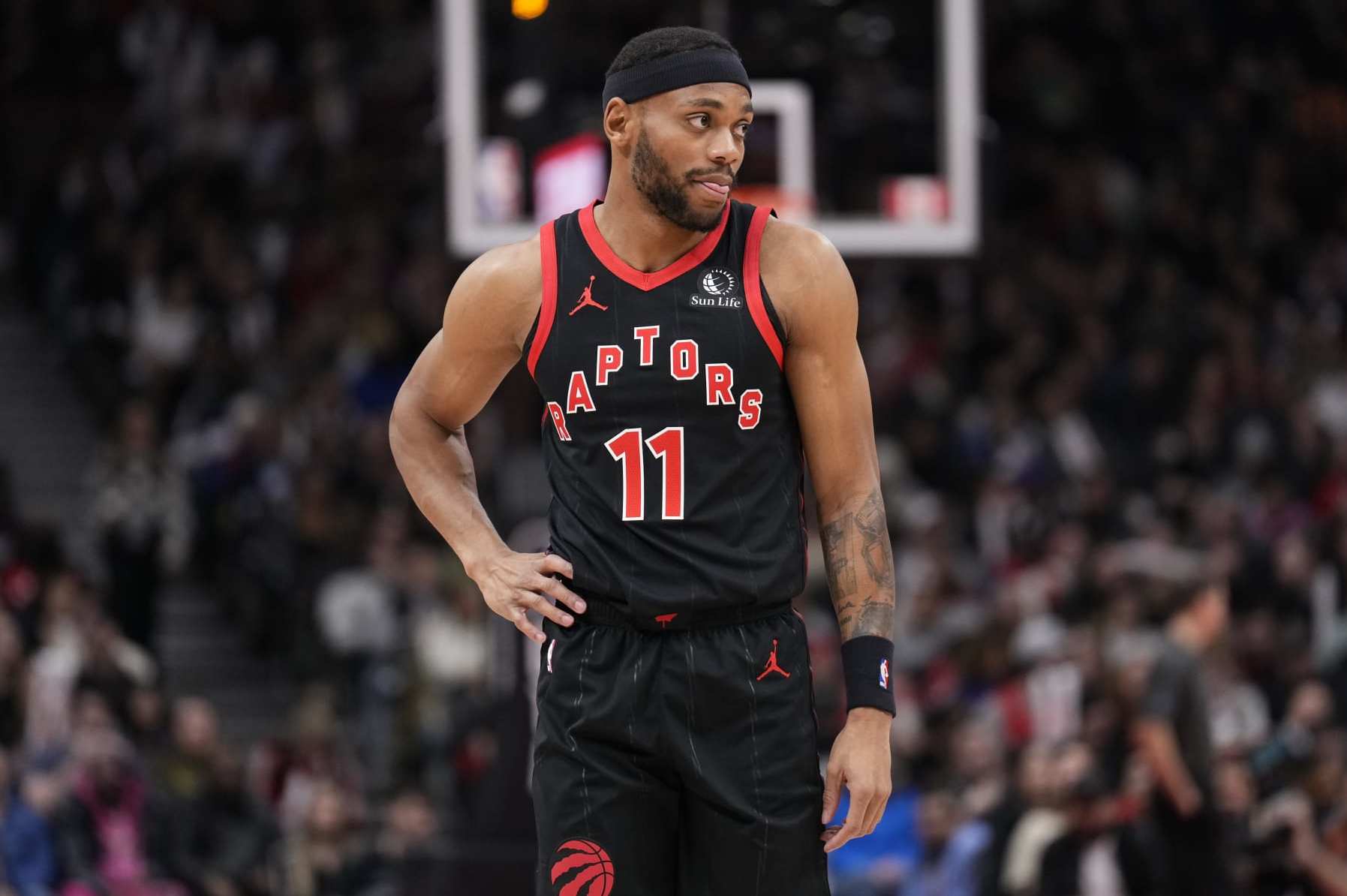 TORONTO, ON - JANUARY 18: Bruce Brown #11 of the Toronto Raptors runs looks on against the Chicago Bulls during the first half of their basketball game at the Scotiabank Arena on January 18, 2024 in Toronto, Ontario, Canada. NOTE TO USER: User expressly acknowledges and agrees that, by downloading and/or using this Photograph, user is consenting to the terms and conditions of the Getty Images License Agreement. (Photo by Mark Blinch/Getty Images)